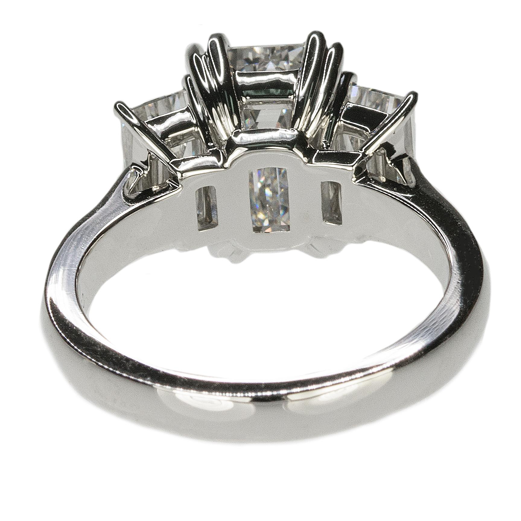 Stunning Platinum Three Emerald Cut Diamond Ring 1