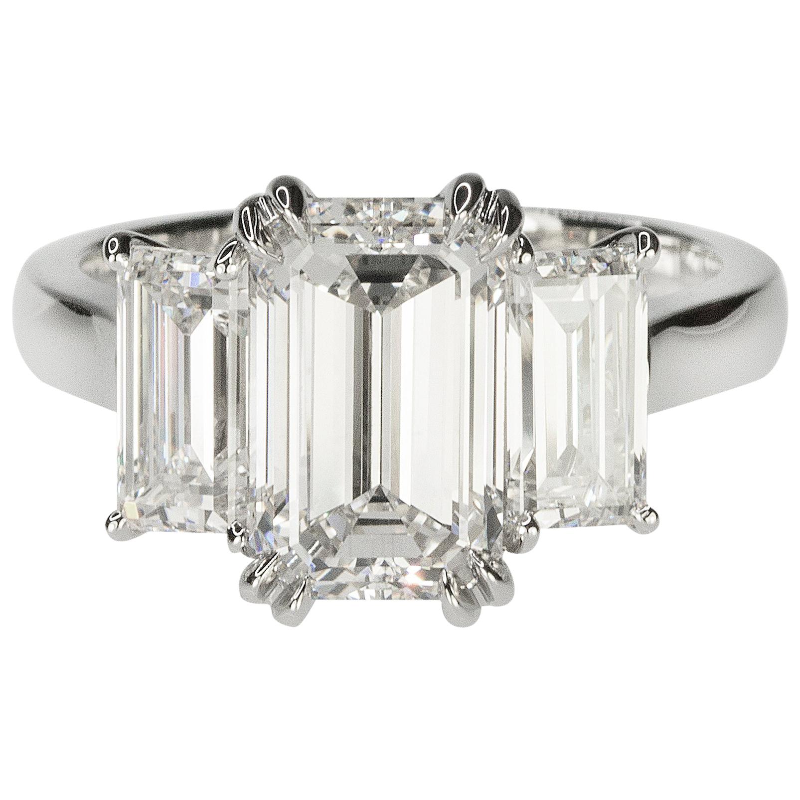 Stunning Platinum Three Emerald Cut Diamond Ring