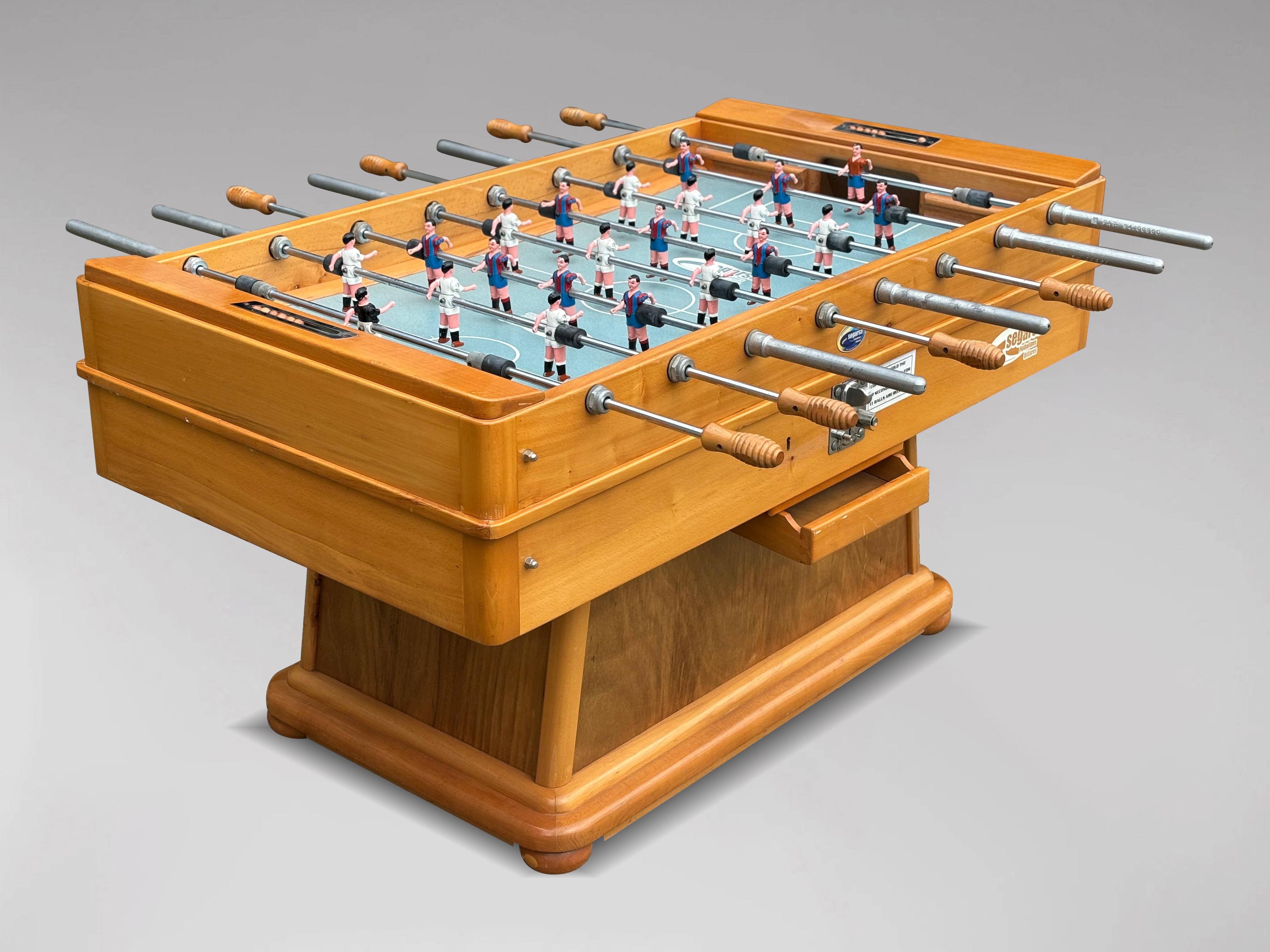A fantastic quality original solid wood-framed Spanish foosball table. Complete with painted metal players, an abacus-type scoring system, and a set of footballs. Two standout features of this wonderfully over-engineered table are: firstly, the
