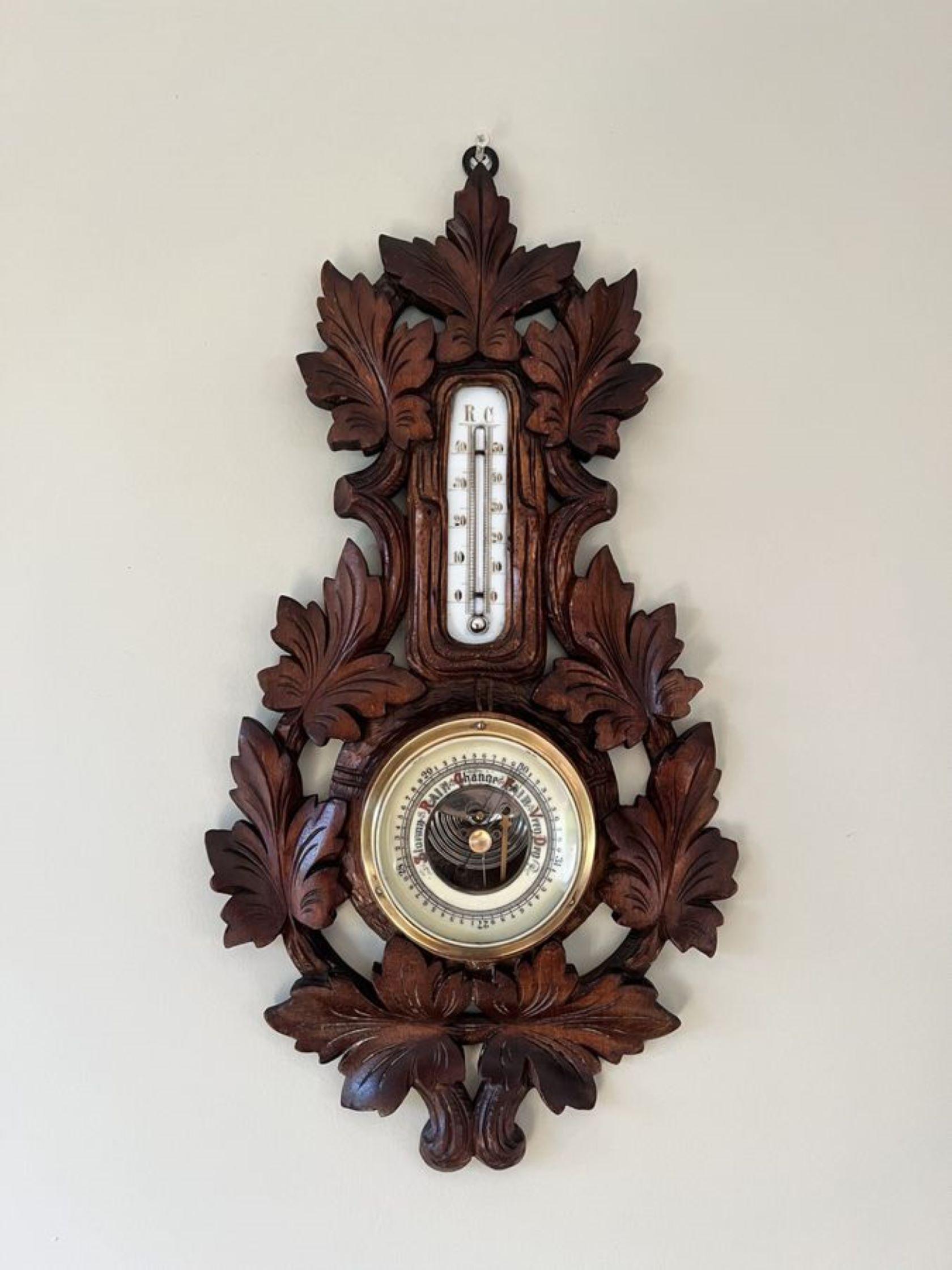 Stunning quality antique Victorian Black Forest aneroid barometer having a fantastic quality antique Victorian Black Forest barometer with a quality carved walnut case with leaves surrounding the barometer with a circular dial, the original hands