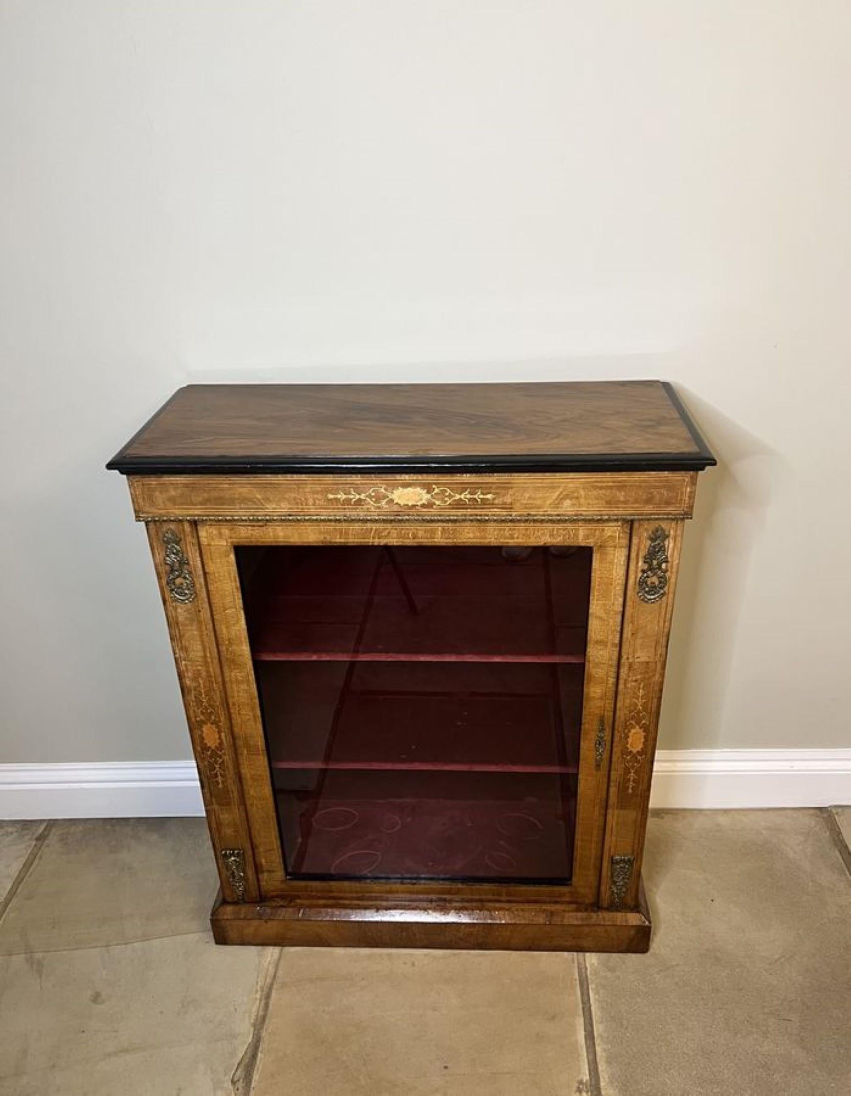 Stunning quality antique Victorian burr walnut inlaid pier cabinet having a quality burr walnut top above a walnut frieze with fantastic satinwood inlay, having a walnut door with a single glass panel opening to reveal two fitted shelves flanked by