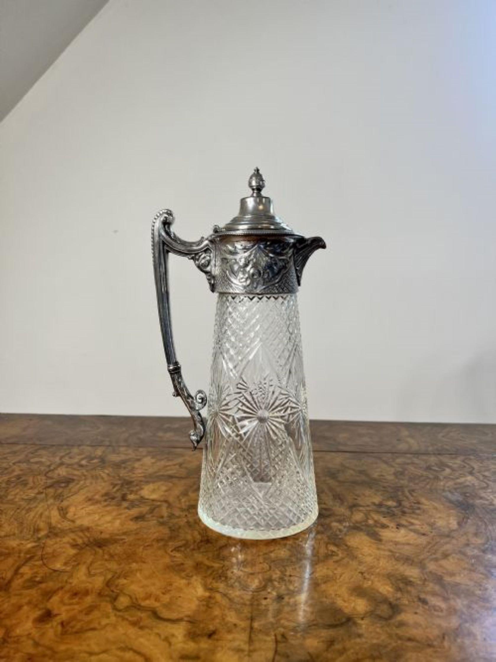 Stunning quality antique Victorian claret jug having a stunning silver plated and cut glass claret jug, with embossed decoration a shaped handle to the back and figural spout.
