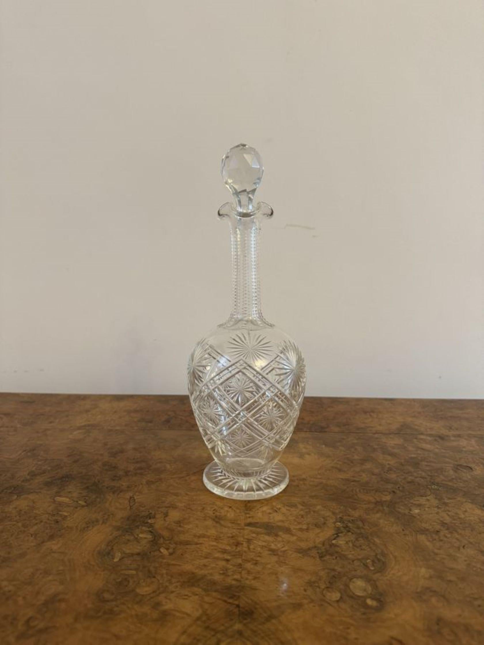 Stunning quality antique Victorian cut glass decanter, having a quality antique Victorian cut glass decanter with a wavy shaped top, raised on a circular base. 

D. 1880