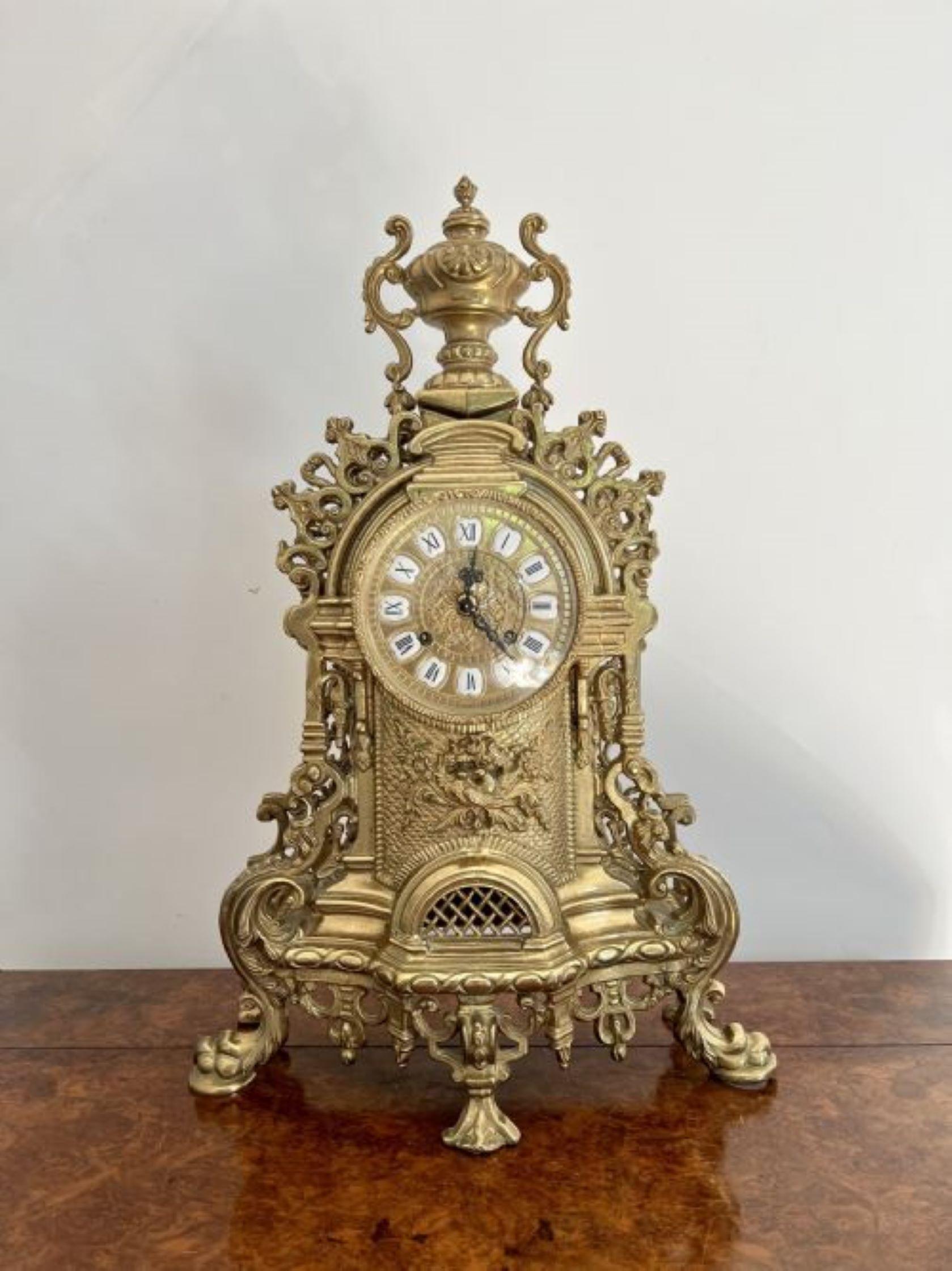 Stunning quality antique Victorian ornate brass mantle clock having a quality Victorian ornate brass mantle clock the clock itself having a chapter ring with enamel roman numeral cartouches, original hands and a brass bezel, with an eight day