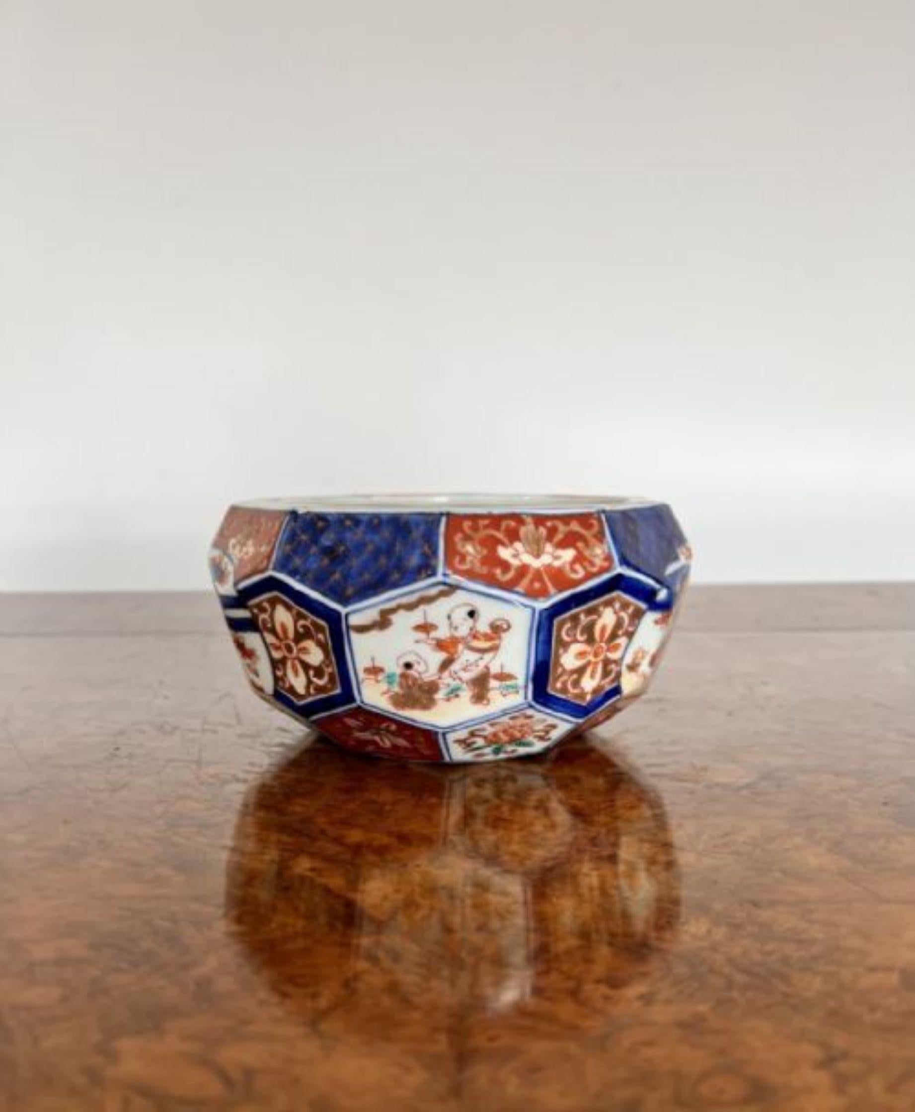 Stunning quality unusual hexagonal shaped antique Japanese imari bowl having an unusual hexagonal shaped imari bowl in red, blue white and gold colours, hand painted decorated panels with people, flowers, leaves and scrolls. Having wonderful
