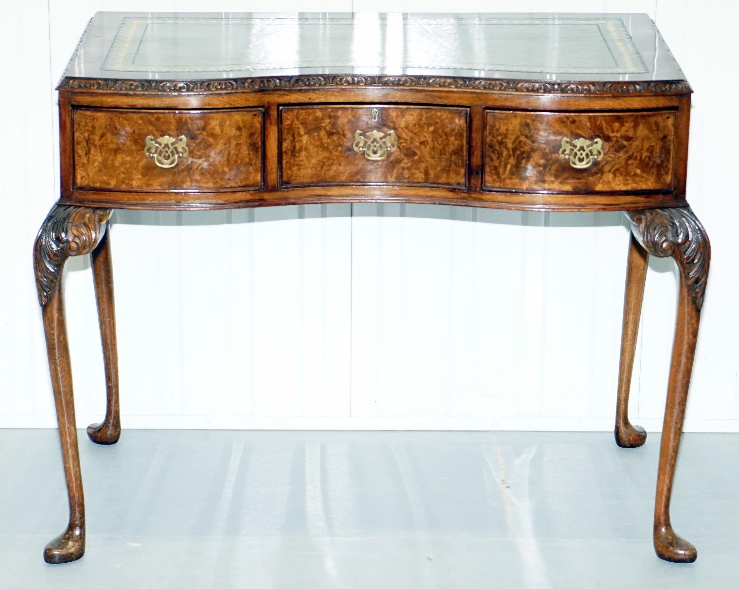 We are delighted to offer for sale this stunning handmade in England flamed Walnut Queen Anne pad foot writing, hall table

A very good looking and well-made piece, the timber patina is truly glorious, the legs are carved to the top and nicely pad