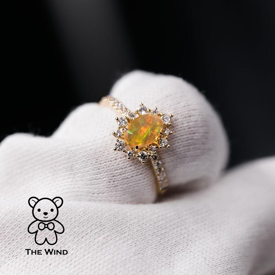 Stunning Rainbow Colored Mexican Fire Opal Diamond Engagement Ring 18K Yellow Gold.

Free Domestic USPS First Class Shipping!  Free One Year Limited Warranty!  Free Gift Bag or Box with every order!



Opal—the queen of gemstones, is one of the most