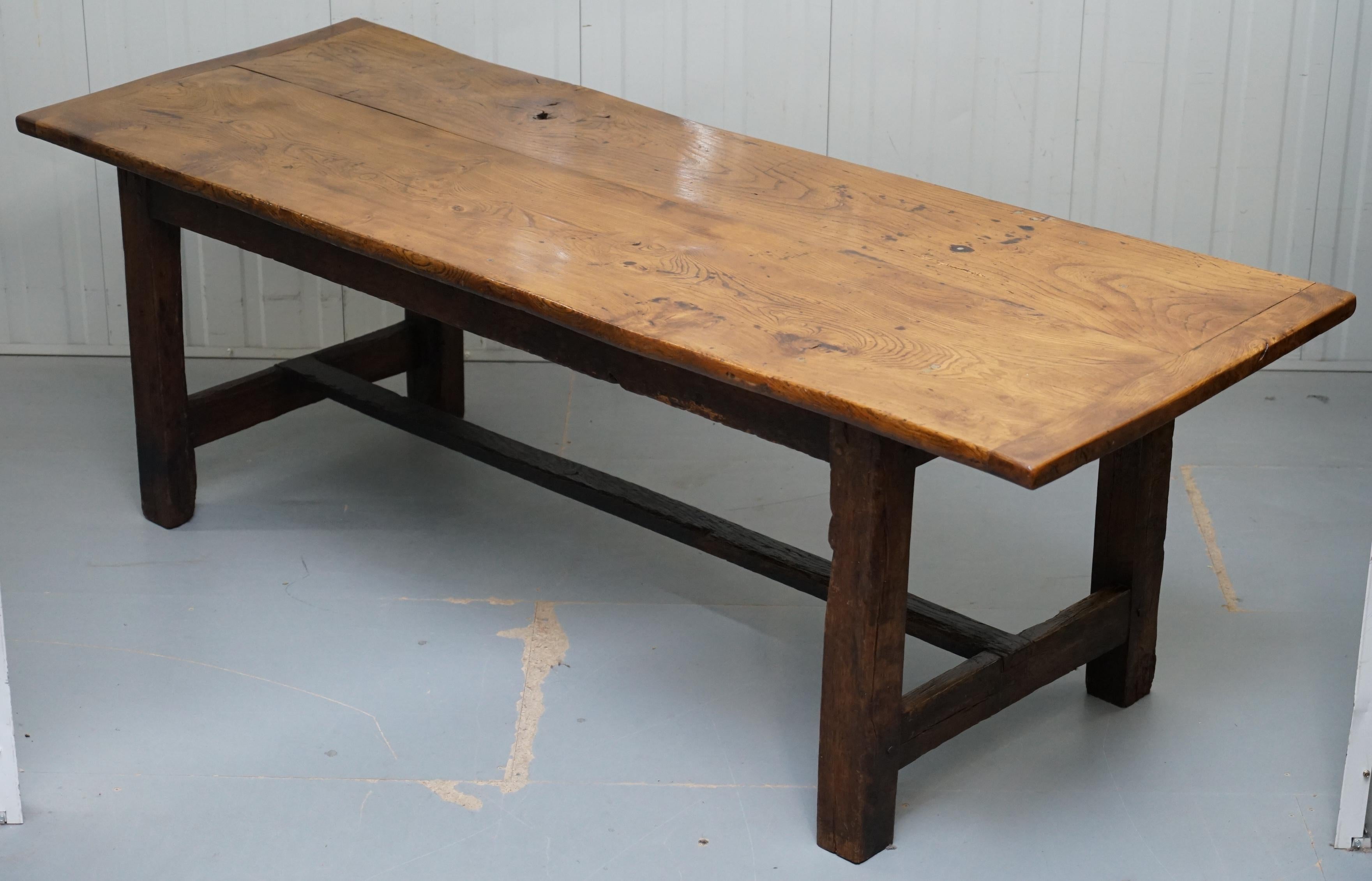 We are delighted to offer for sale this absolutely stunning original 18th century solid Elm farmhouse country heavily used dining table that seats 8-10 people

If you’re looking for the real deal then look no further, this table is just about as