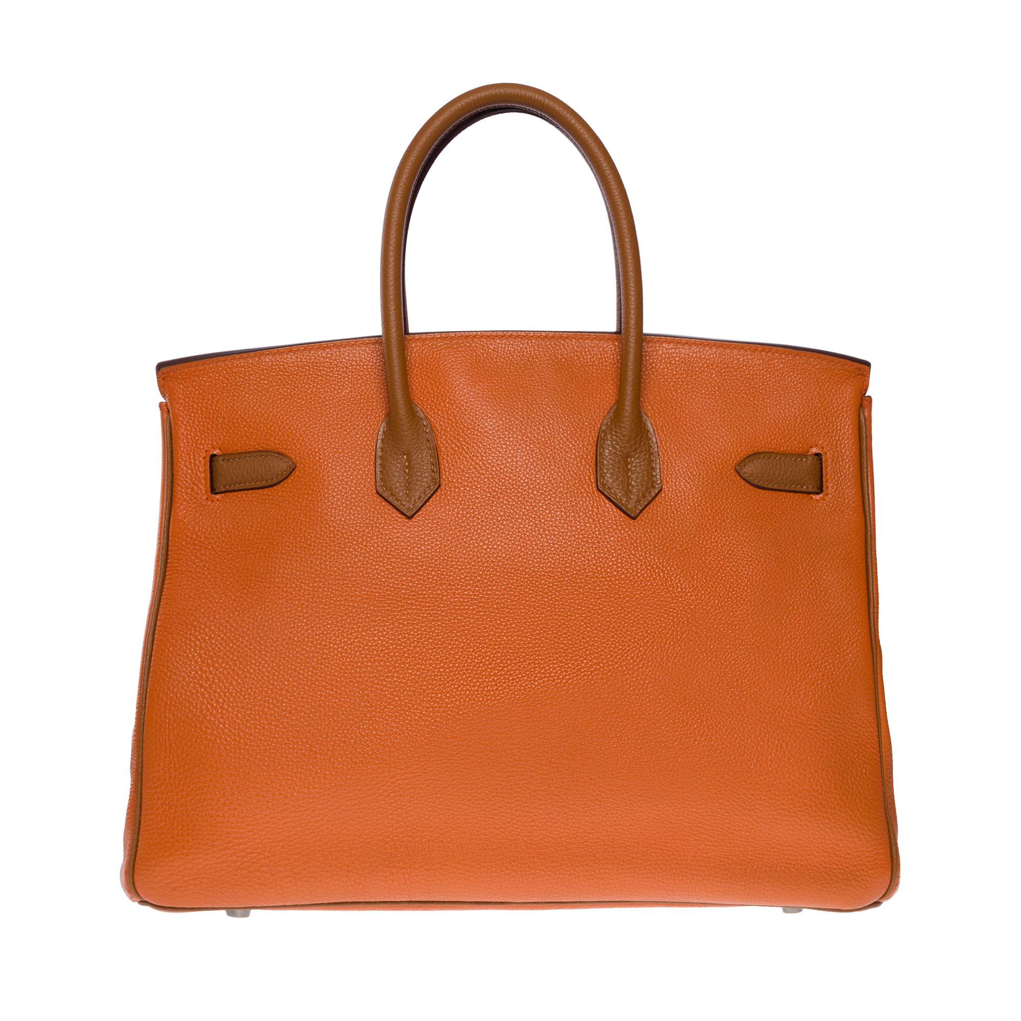 Splendid & Rare Birkin 35 two-tone handbag in orange and camel Togo leather, camel togo leather beads, palladium silver metal hardware, double handle in camel leather allowing a hand carry

Flap closure
Camel leather lining, one zippered pocket, one