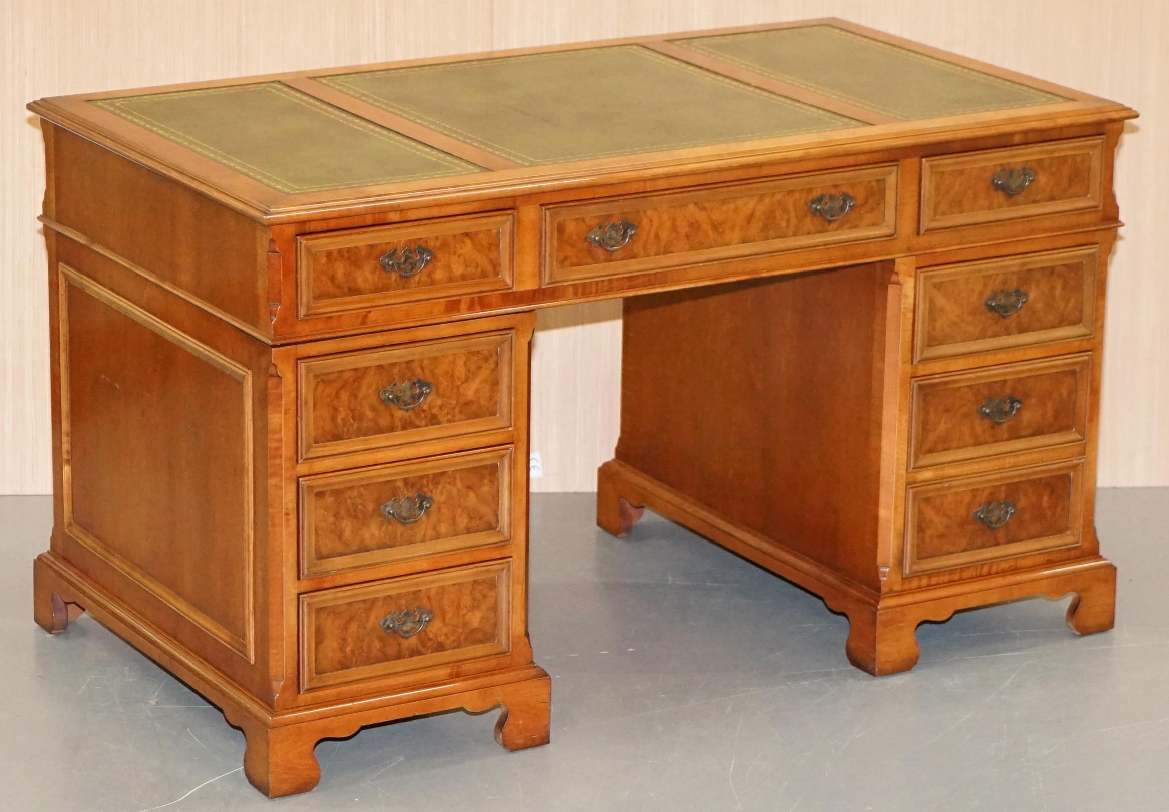 We are delighted to offer for sale this stunning burr walnut twin pedestal partner desk with green leather top and custom made to order drawer tops to be used as butlers trays or mouse shelves

A very good looking and well made desk, there are