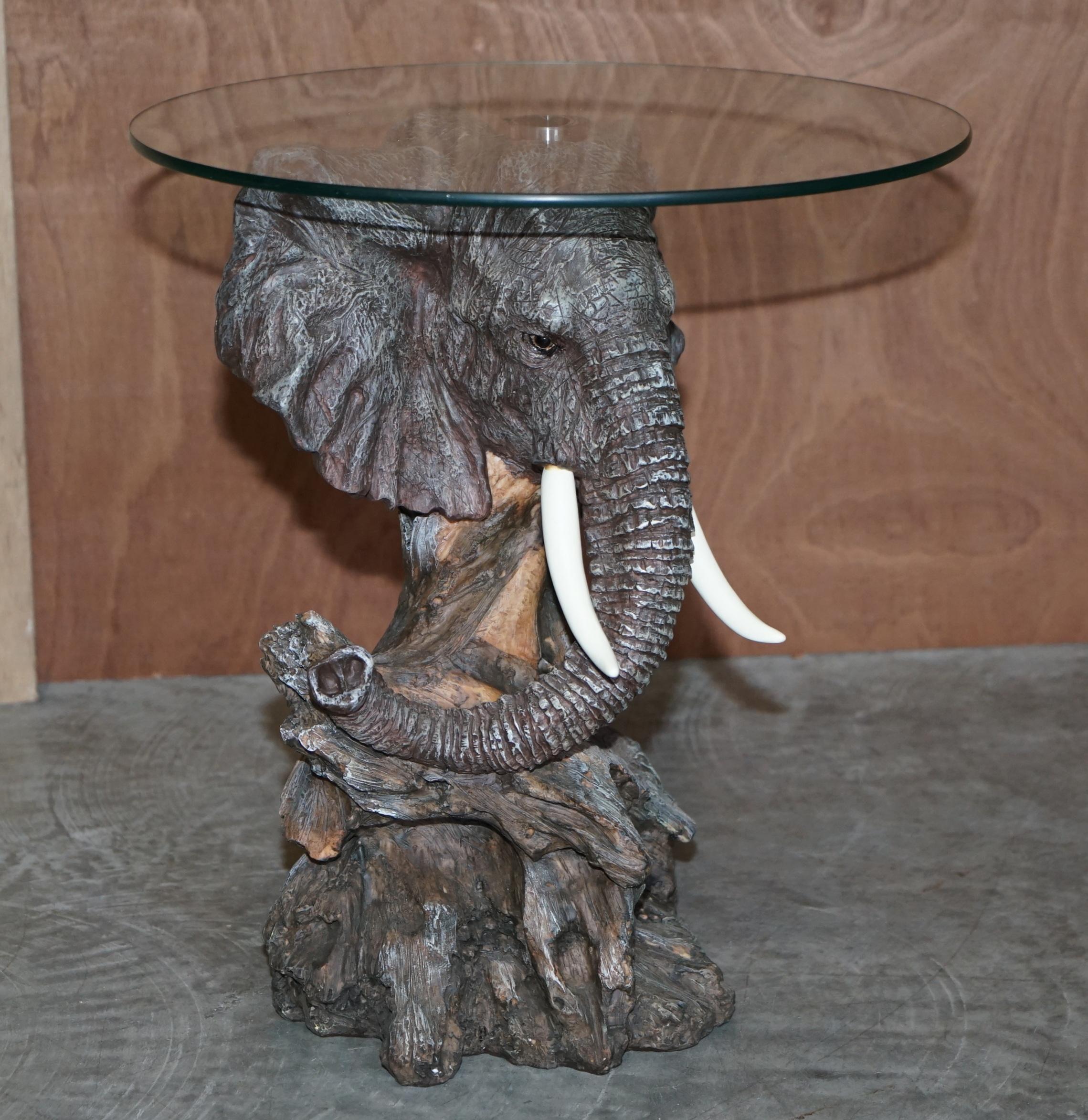 We are delighted to offer this realistically cast hand painted Elephants head side table with beautiful serene expression

A wonderful looking piece, the look in the eyes is so deep and sincere, I have never seen a piece of sculpture or art that