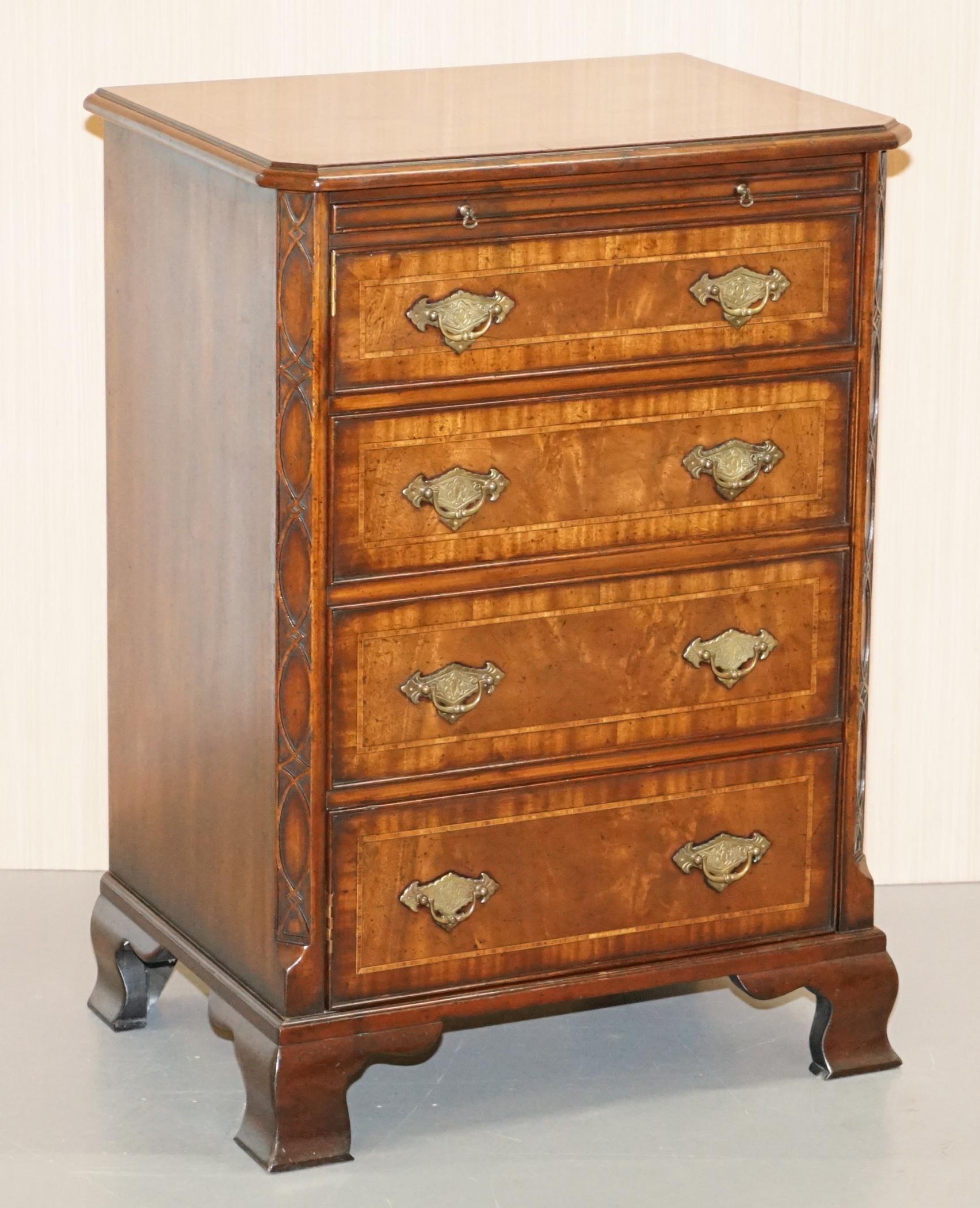 We are delighted to offer for sale this lovely Record Player cupboard which is hidden as a Regency style chest of drawers in solid flamed mahogany 

A very well made and decorative piece of metamorphic furniture, the top rises to reveal a space to