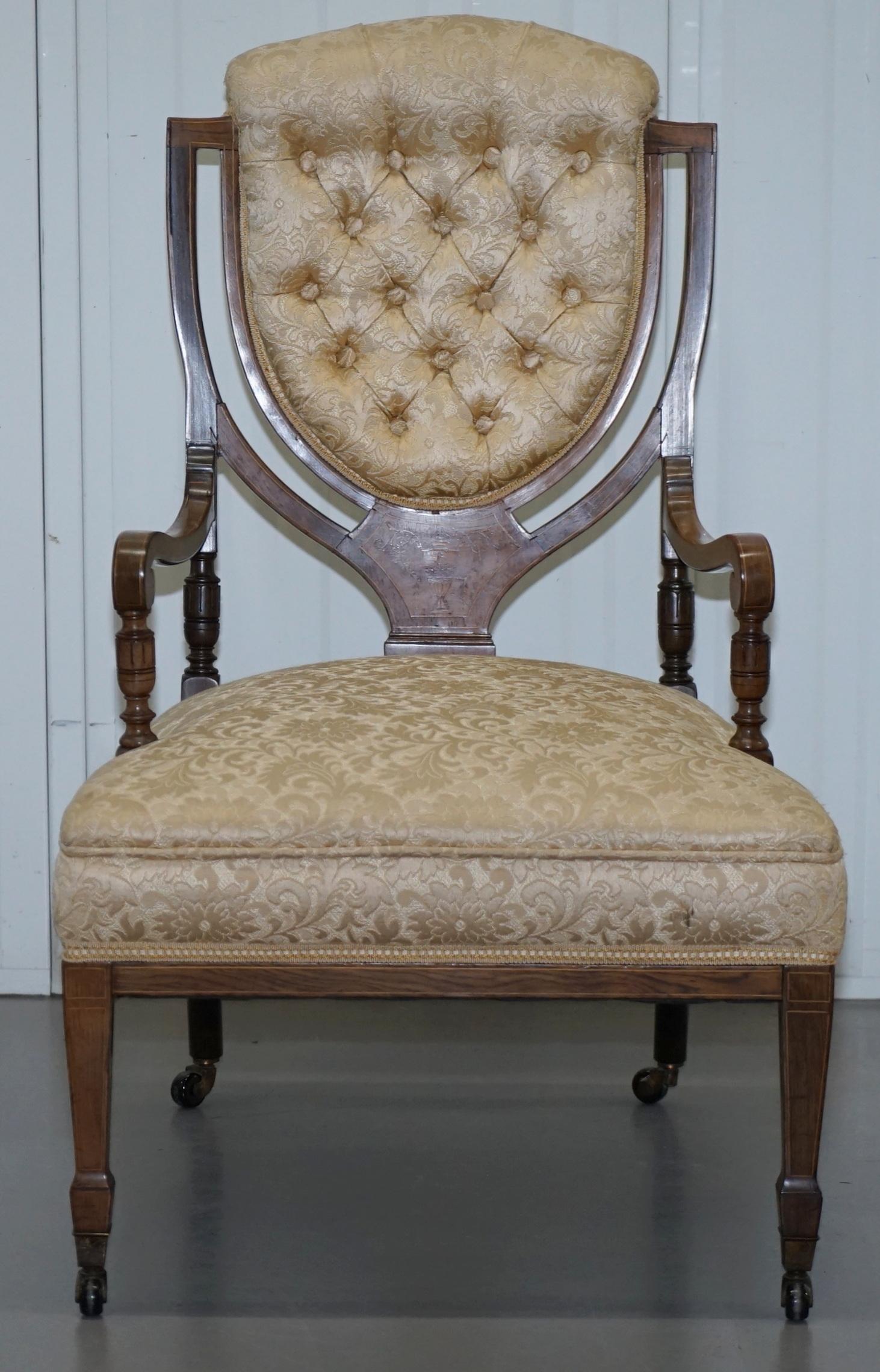 We are delighted to offer for sale this stunning solid Rosewood Sheraton revival style Chesterfield buttoned armchair dating from 1900

This item is part of a suite, I have one single chair and then another matching pair of the standard chairs,