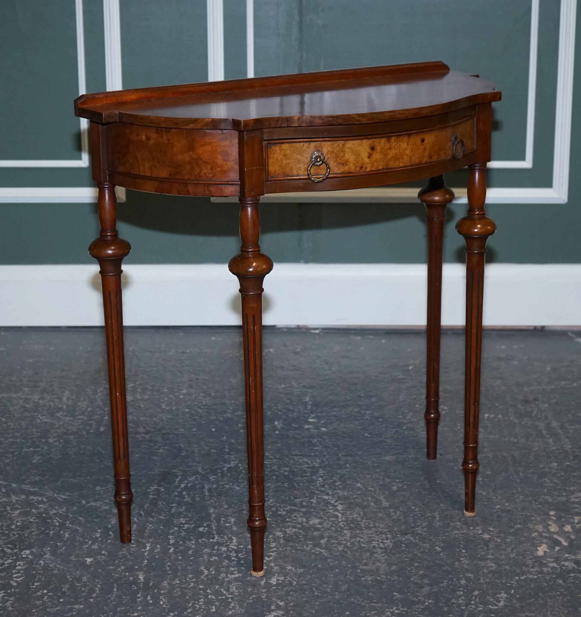 We are excited to present this Restored French Polished Burr Walnut Demi Lune Table.

This item has been stripped back and had a good French polish to restore the piece. 

Condition-wise, there will be some aged-related marks, please look