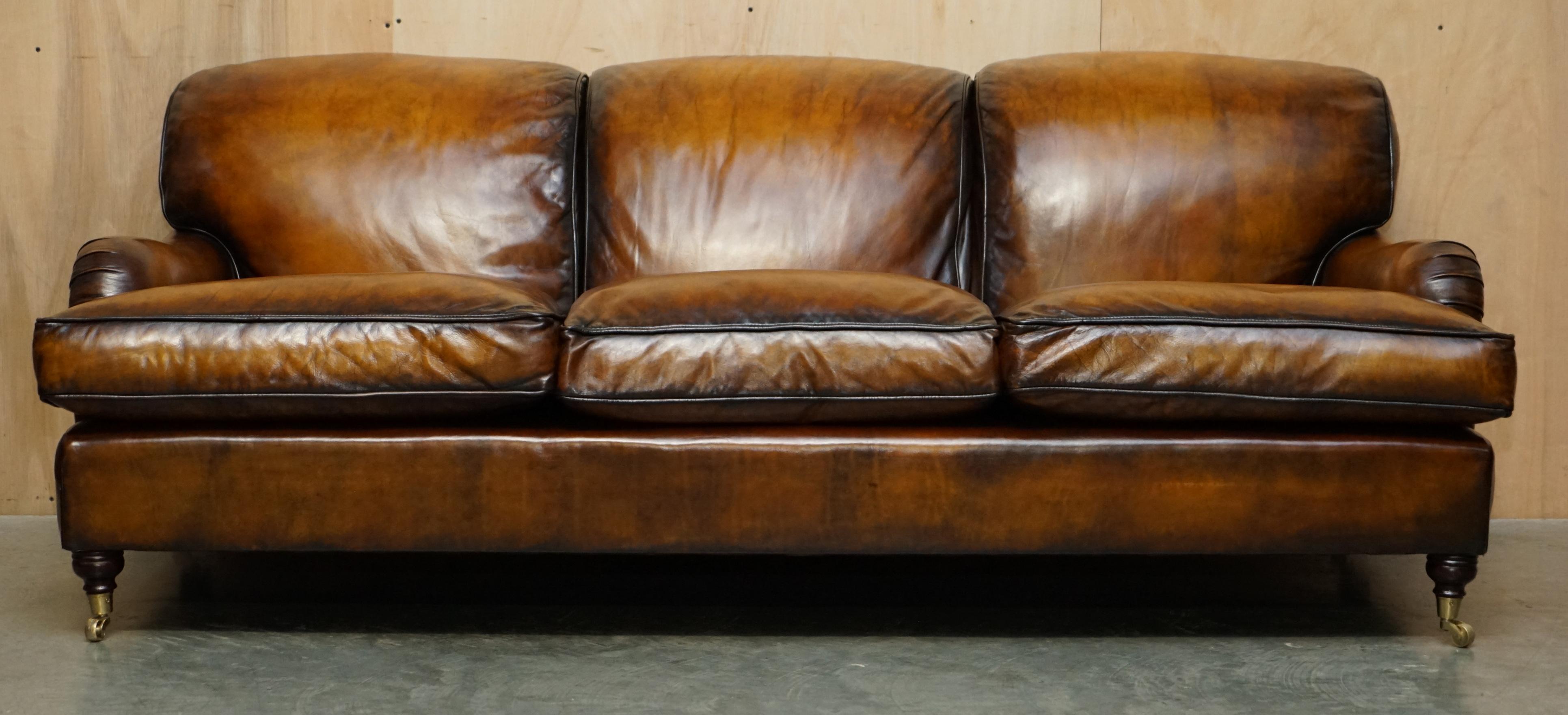 Royal House Antiques

Royal House Antiques is delighted to offer for sale this lovely vintage fully restored hand dyed brown leather Howard & Son’s style three seat sofa with overstuffed feather filled cushions which is part of a suite

Please note