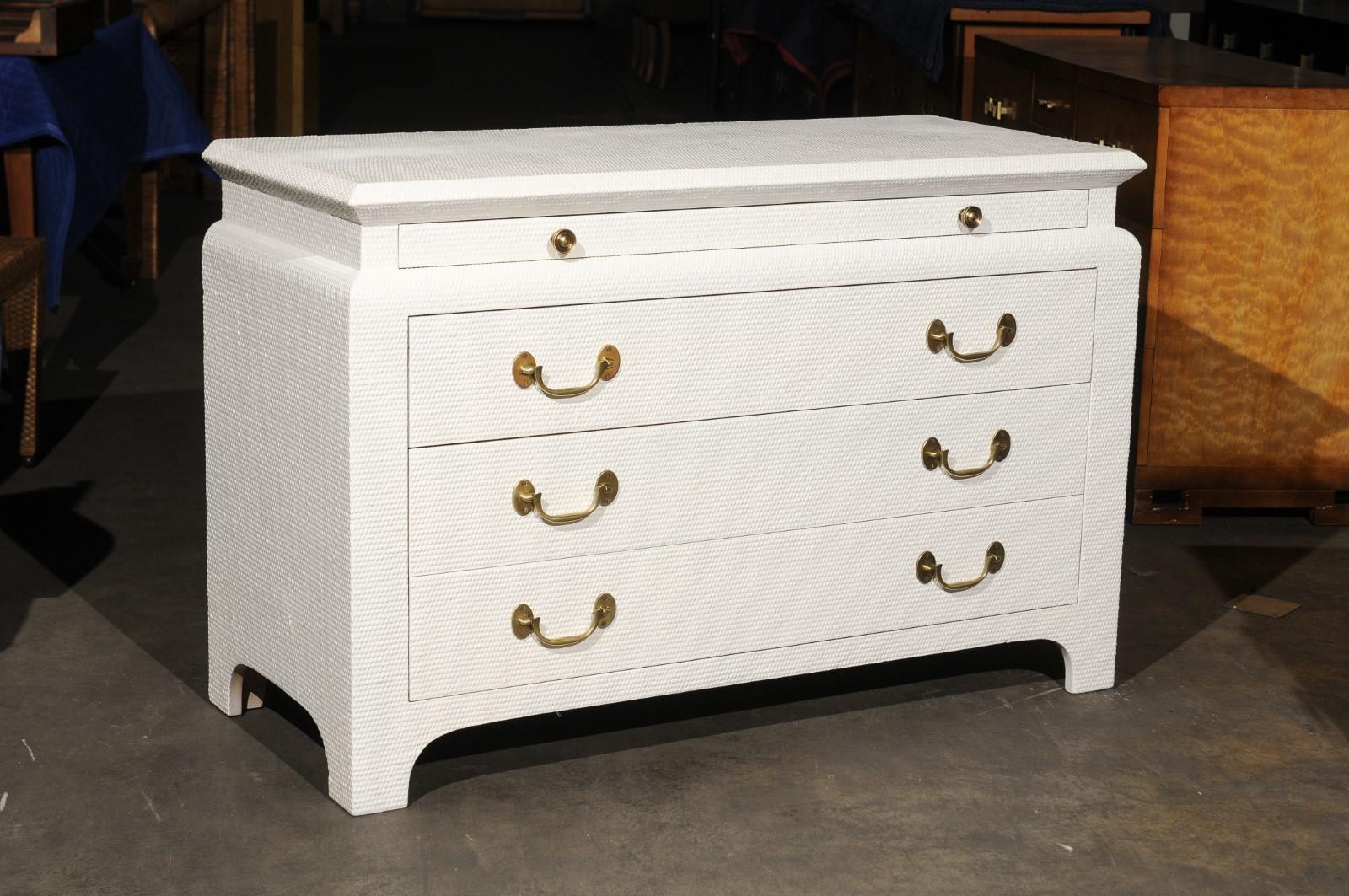 A stellar three-drawer chest from the boutique production of Harrison-Van Horn, circa 1985. Pair available. Exquisite solid mahogany case design with fabulous lines. Stylish Pagoda top detail and solid brass hardware add drama. The piece is veneered