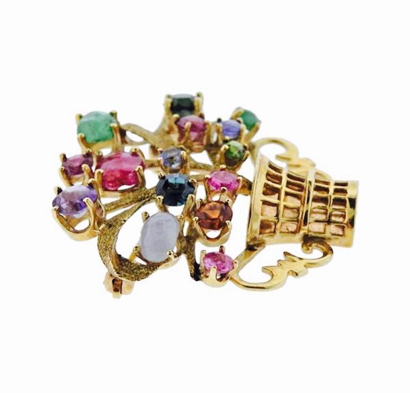 Lovely Retro 14k Gold Cartier Gemstone Tourmaline Sapphire Pin Pendant Brooch.

This is an amazing opportunity to get a authentic CARTIER piece!!! This brooch is a gorgeous 14 karat gold, multi gemstone brooch with Pink and Green Tourmaline, Blue