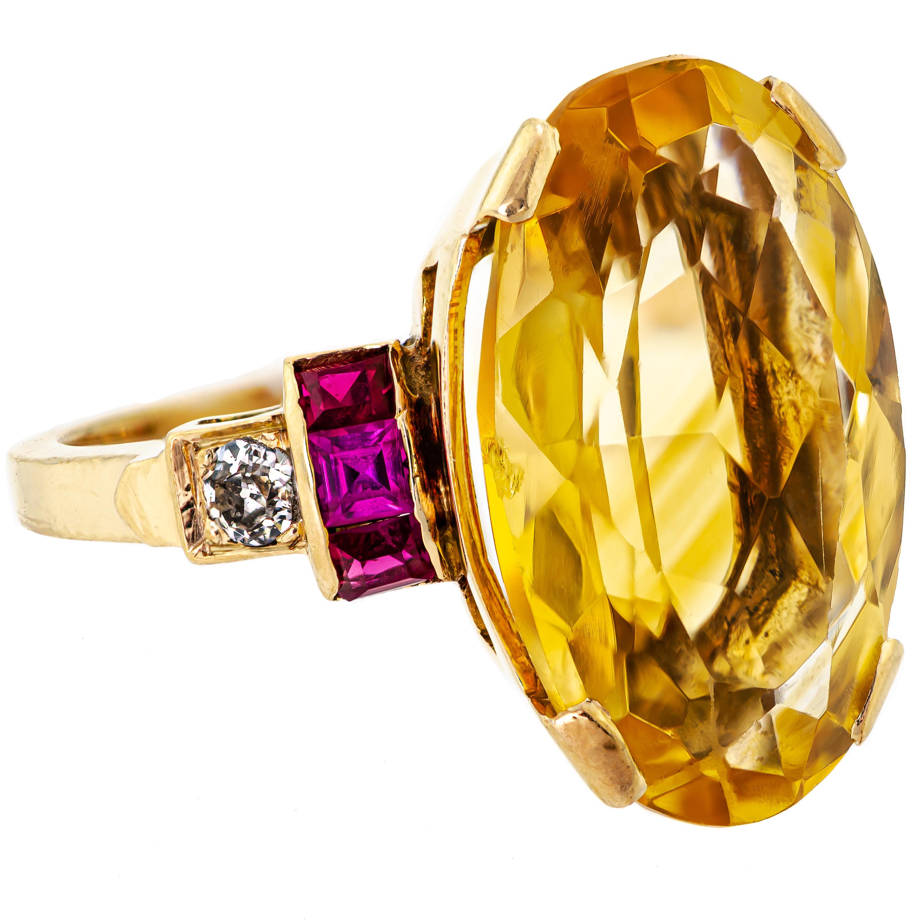 This is a gorgeous Retro-style cocktail ring from circa 1940, made of 14kt yellow gold. The ring features a stunning oval-shaped brilliant-cut citrine at its center, which is approximately 18mm x 10.9 mm x 6.9 mm in size and weighs approximately