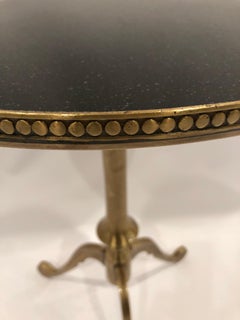 Atemberaubender runder Martini-Beistelltisch aus schwarzem Granit und Messing