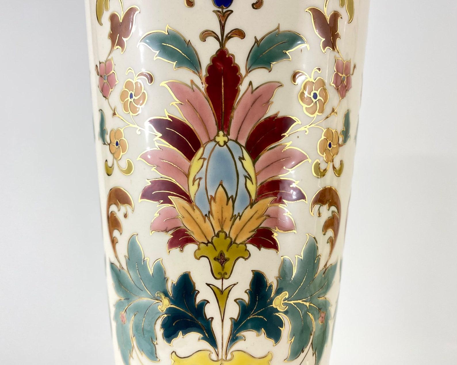 Gorgeous pair of large German Royal Bonn hand-painted vases with floral motif, late 19th-early 20th century.

 Made by Franz Anton Mehlem, these impressive vases stand on a wide rounded leg and have a wide body. 

 The body of the vase is