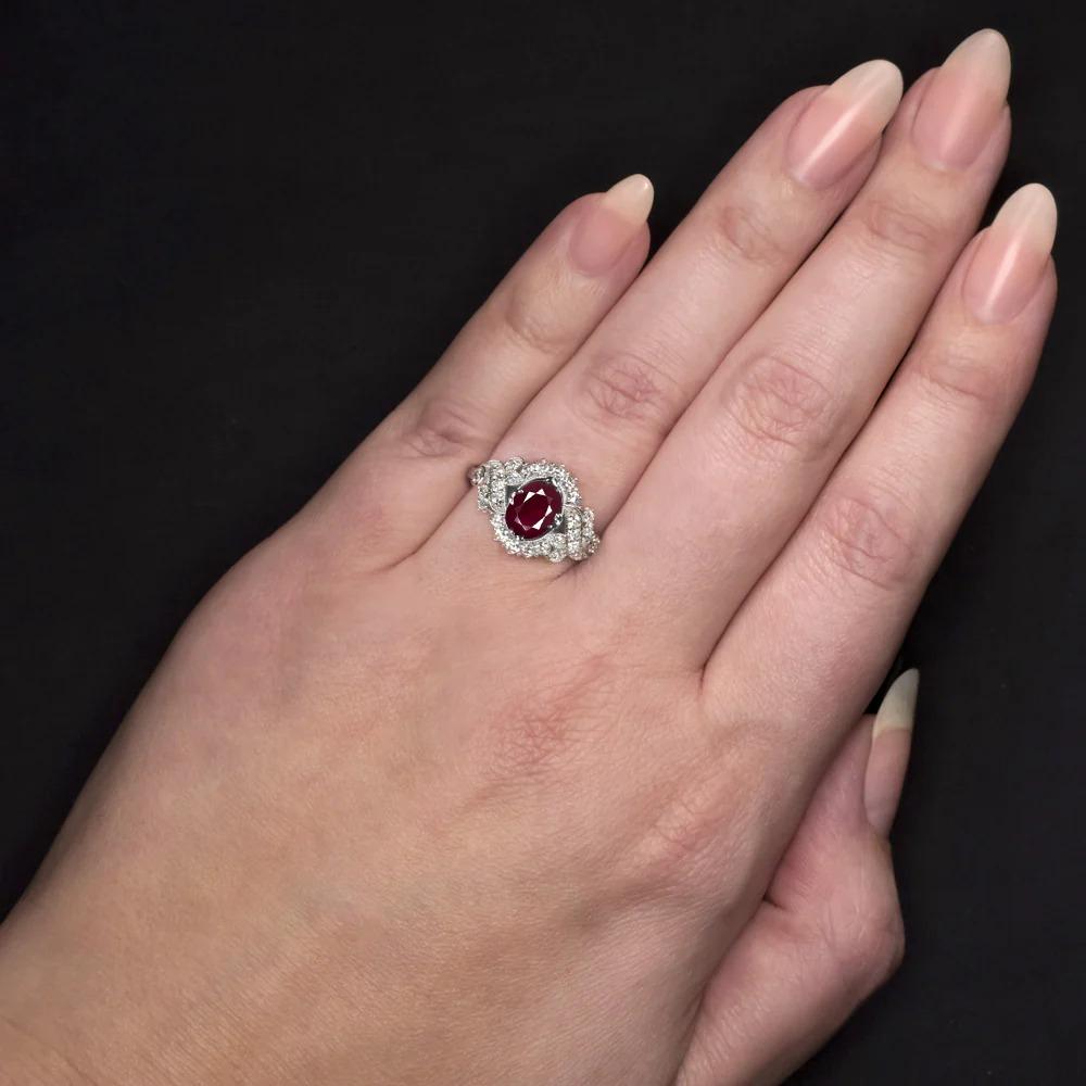 stunning ruby and diamond ring has an eye catching look with bright sparkle, gorgeous color, and a glamorous vintage inspired design! The 1.60ct natural ruby is a beautiful rich red hue that contrasts beautifully with the bright white, vibrant