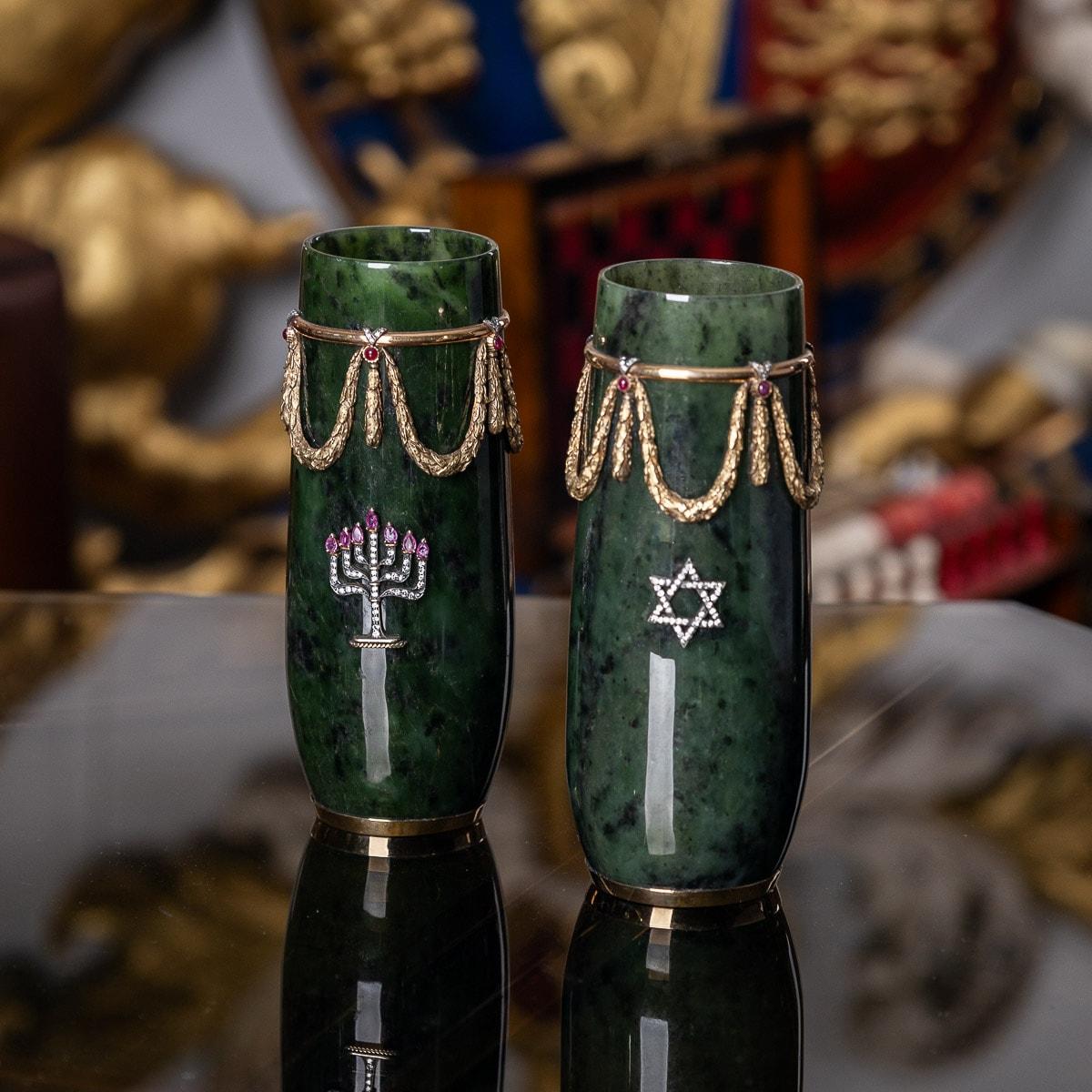 Stunning 20th Century Russian style pair of vases, curved shaped body applied with 14k solid gold laurel garlands suspended from a ring set with bright diamond and cabochon ruby in V junctions. Both sides are applied with a star of David in platinum
