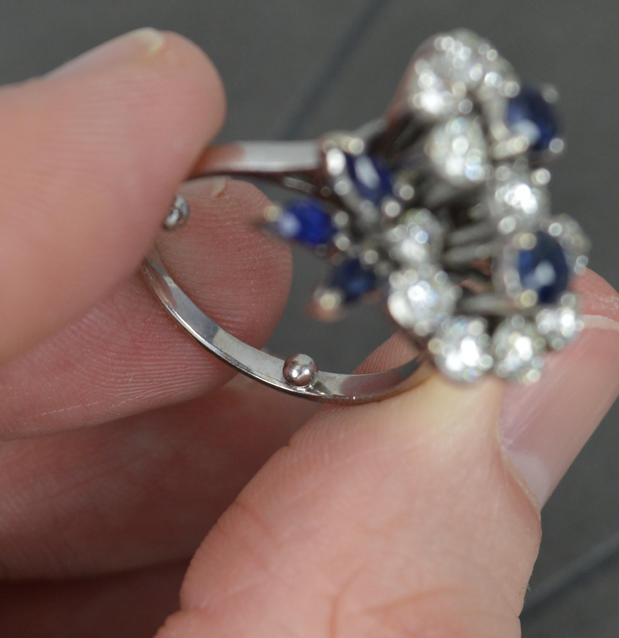 Stunning Sapphire and 1.25 Carat Diamond 18 Carat White Gold Flower Cluster Ring In Good Condition For Sale In St Helens, GB