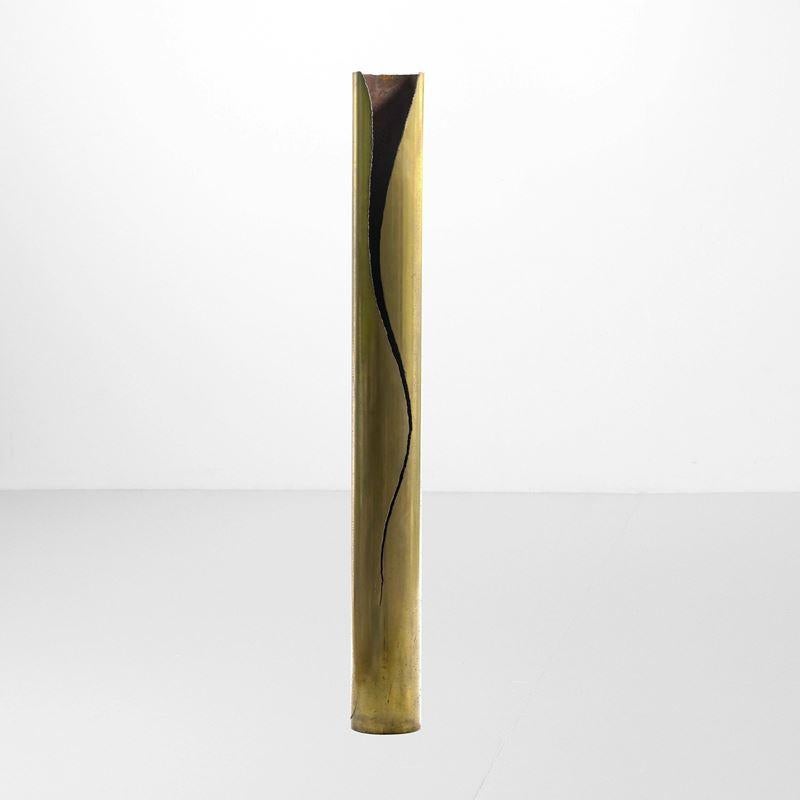 Immerse your space in the exquisite glow of craftsmanship with this sculptural lighting by Gianluca Pacchioni. Forged from bronze, this stunning floor lamp stands as an interior of artistic excellence of  contemporary Italian Design and secular