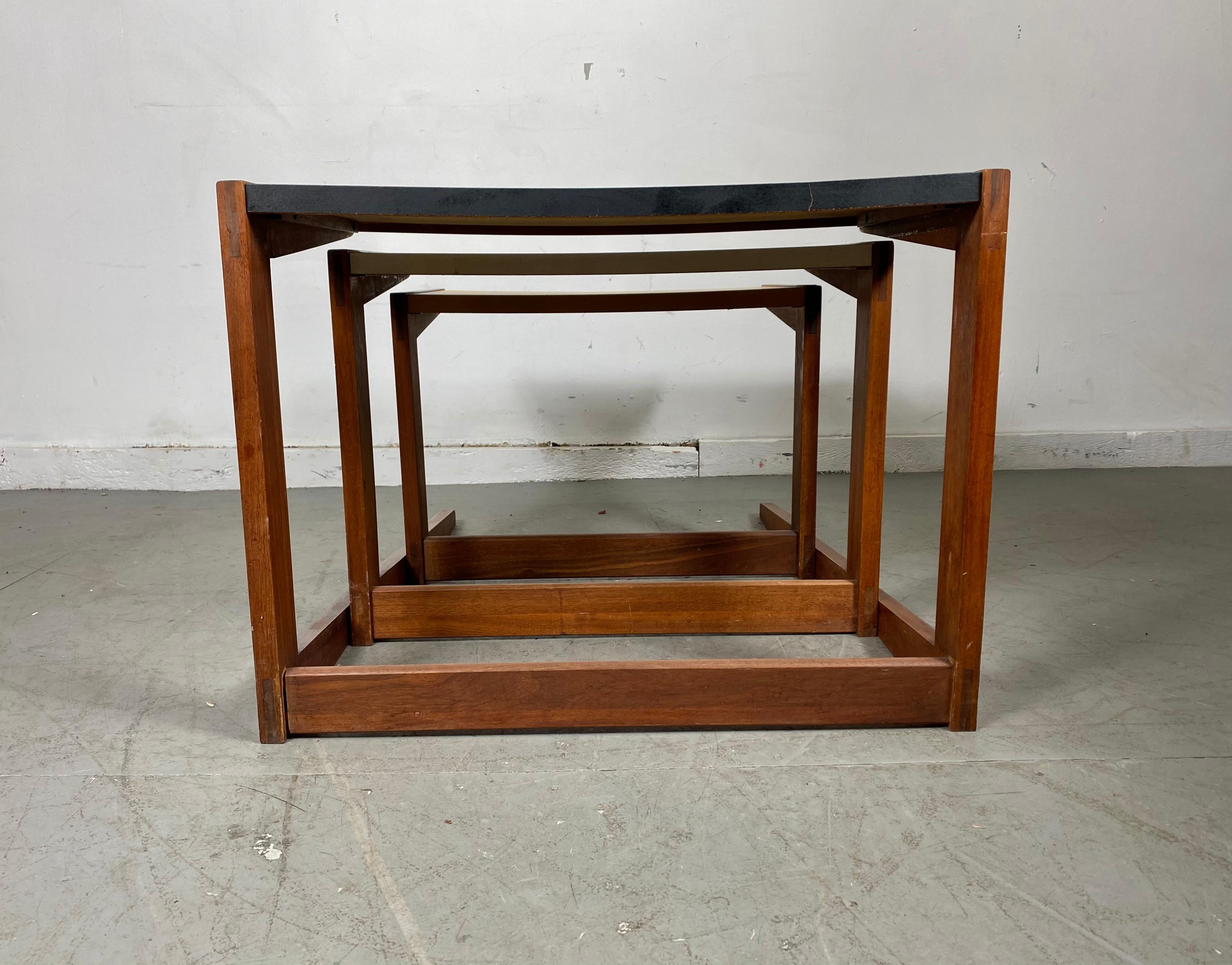 Stunning set of 3 nesting tables attributed to Jens Risom. Classic Mid-Century Modernist design, Very sculptural, architectural, retains original finish, Classic tri-color.