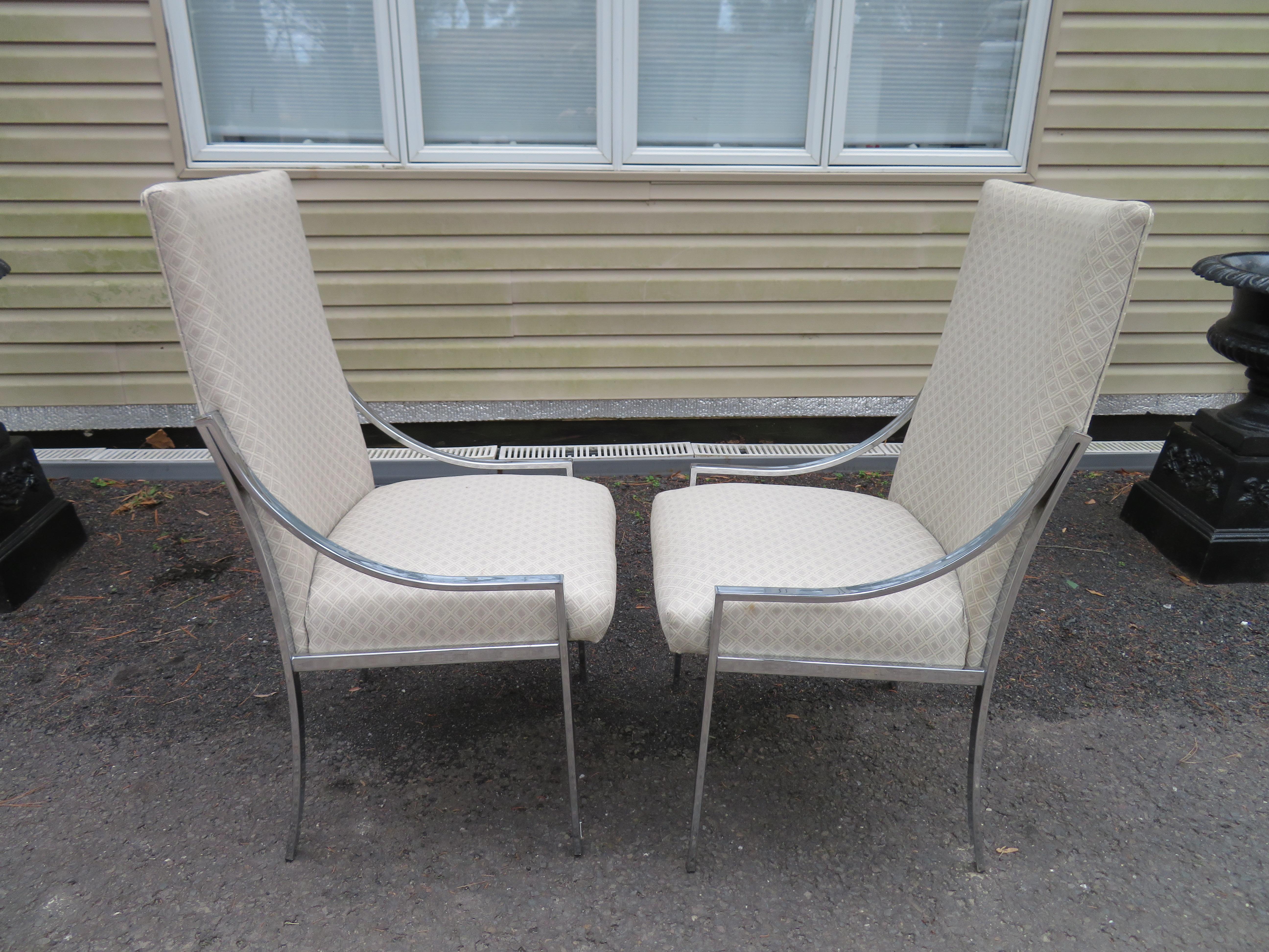 Stunning set of 8 Milo Baughman D.I.A. dining chairs. This set is in wonderful vintage condition with super shiny chrome frames and nice clean upholstery. The fabric looks like it was replaced in the 1990s and still looks nice-some minor spots. This