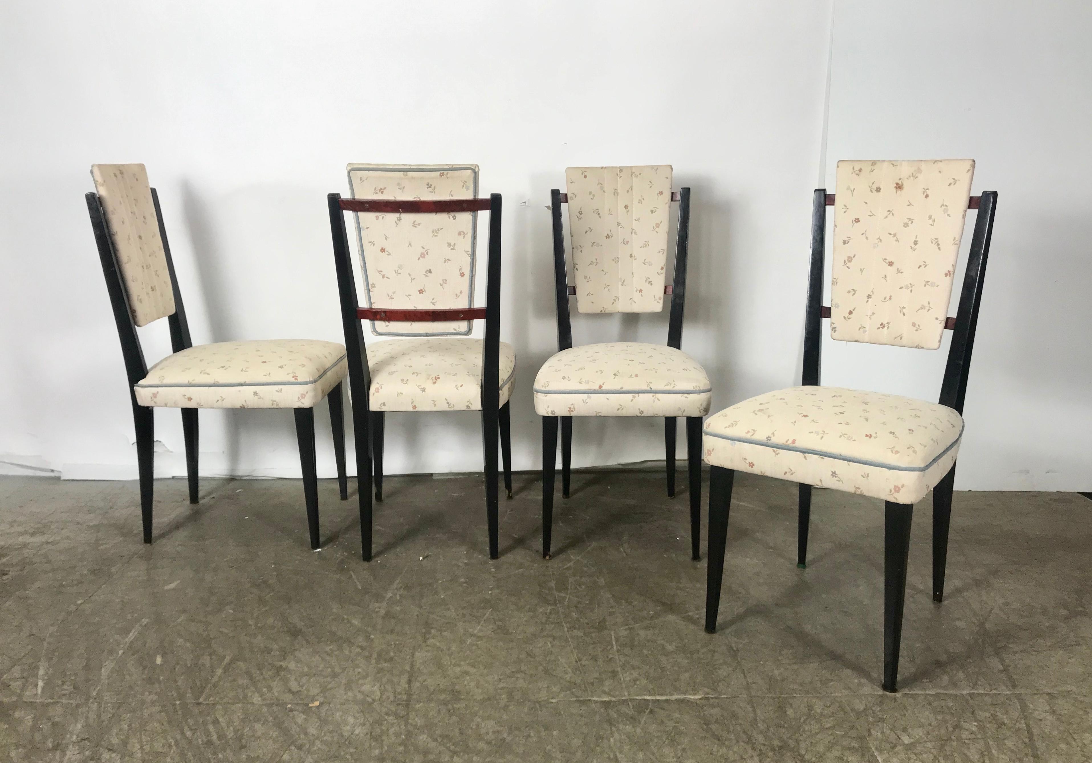 Stunning set of 12 Italian modernist dining chairs attributed to Osvaldo Borsani, Classic modern design, fit seamlessly into any modern, antique, traditional or contemporary environment. Black lacquer frames with amazing burl wood back detail, Can