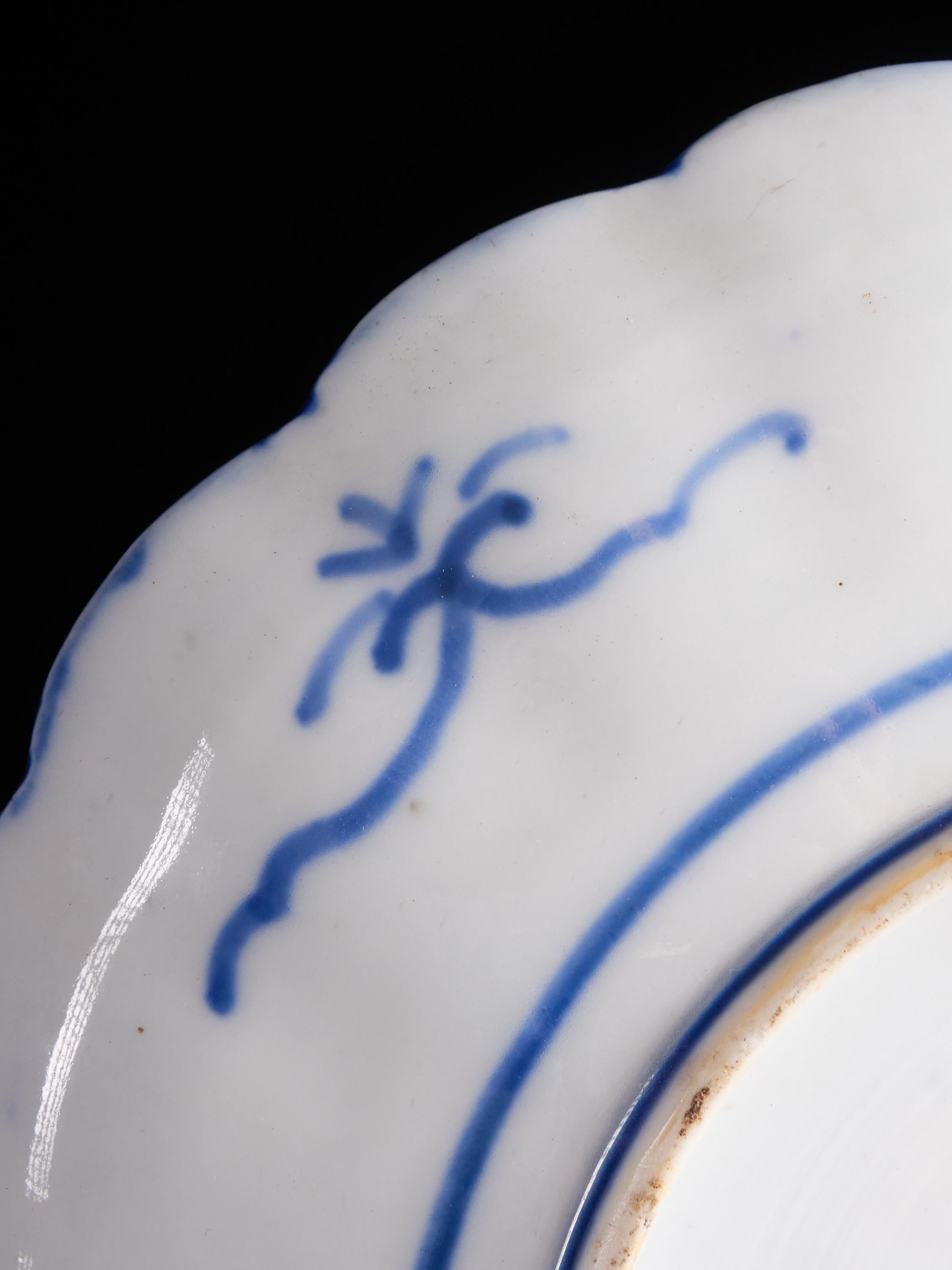 Stunning Set of 3 White Ceramic Plates with Ornate Indigo Blue Designs 1