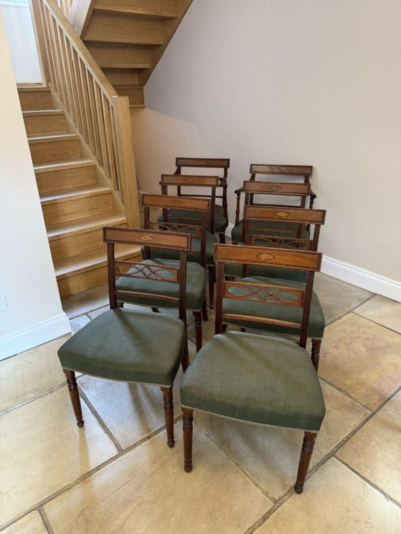 Stunning set of eight antique George III mahogany inlaid dining chairs, consisting of a pair of carver chairs and six single chairs with a quality mahogany reeded top rail with a shell inlaid carved mahogany centre splat, stuff over seats standing