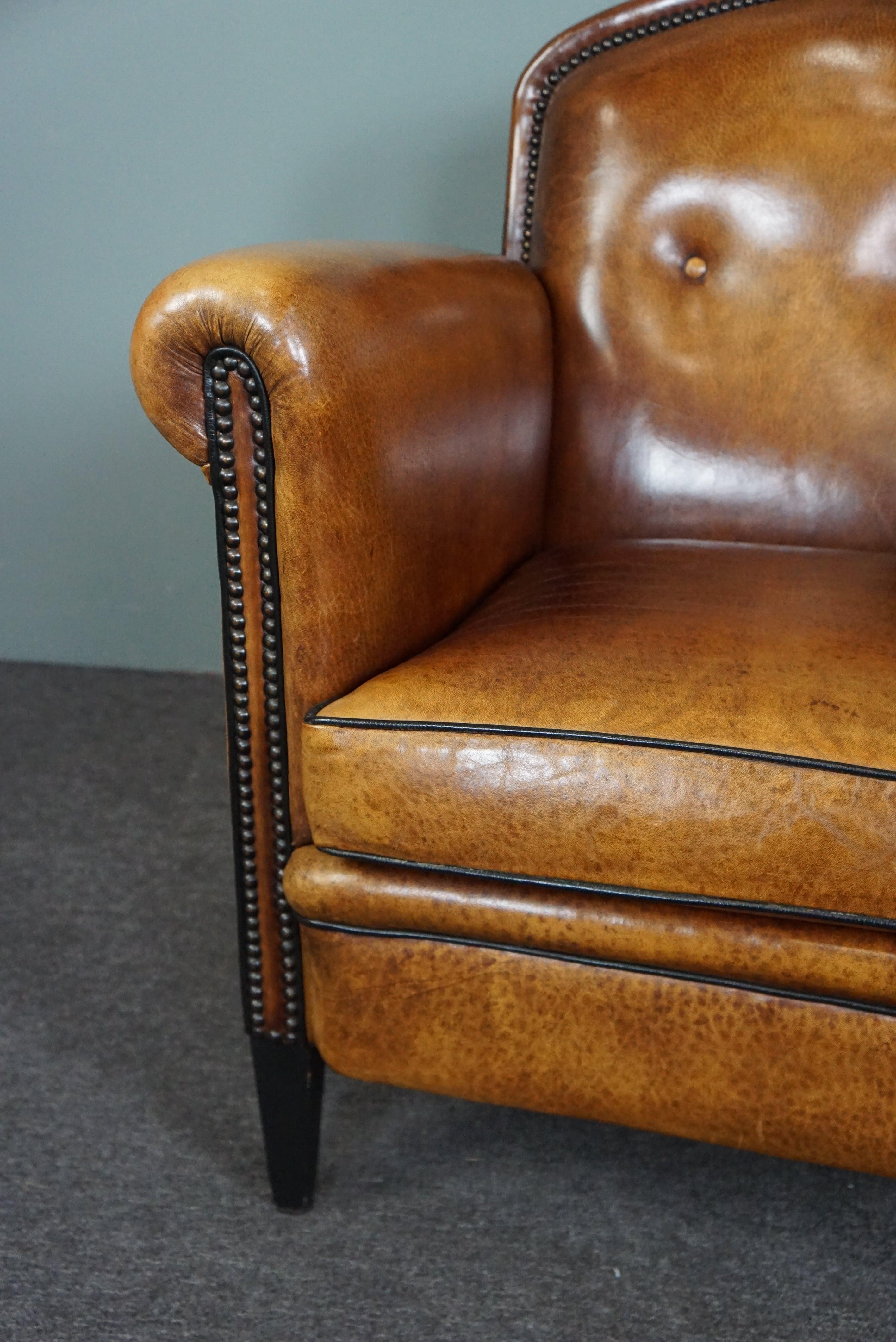 Leather Stunning sheepskin armchair in very good condition For Sale