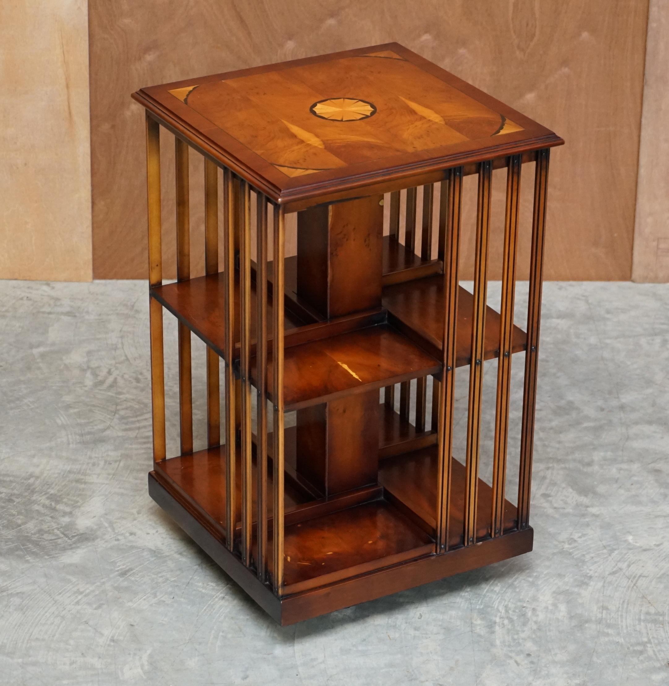 We are delighted to offer for sale this stunning vintage Sheraton Revival burr Yew & Satinwood revolving bookcase table

A very good looking well made and decorative piece. Made in the Sheraton revival style with wonderful inlay and extremely