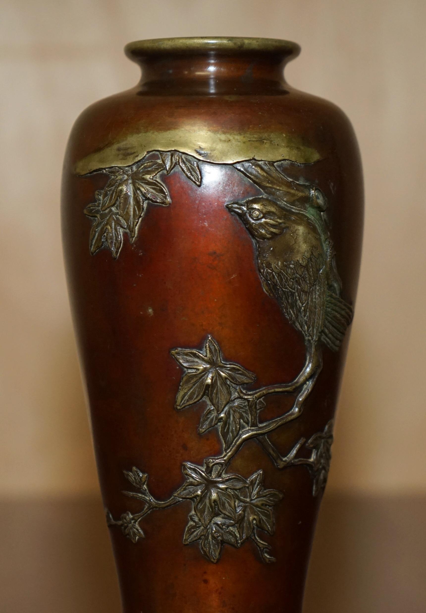 Royal House Antiques

Royal House Antiques is delighted to offer for sale this absolutely stunning circa 1870 signed to the base solid bronze Japanese bronze vase depicting a large bird on a branch

A wonderfully original find, this isn’t one of the