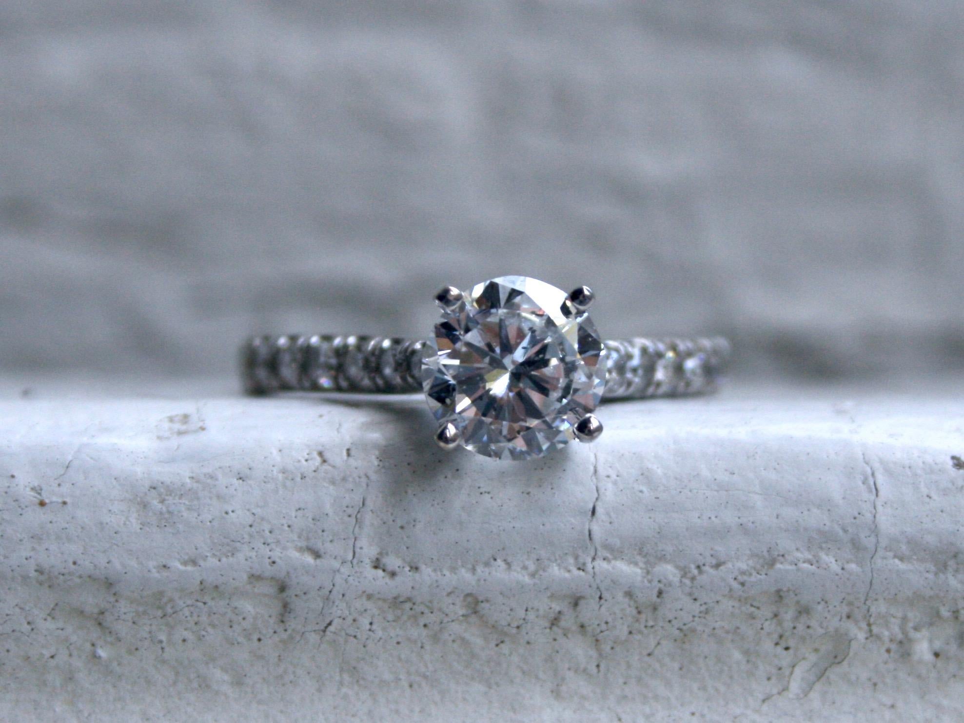 Such a beautiful classic style! It really doesn't get any better than this! This Stunning Simple Vintage Diamond Ring Engagement Ring is all about classic styling, great sparkle, and excellent craftsmanship. Crafted in 18K White Gold, the ring