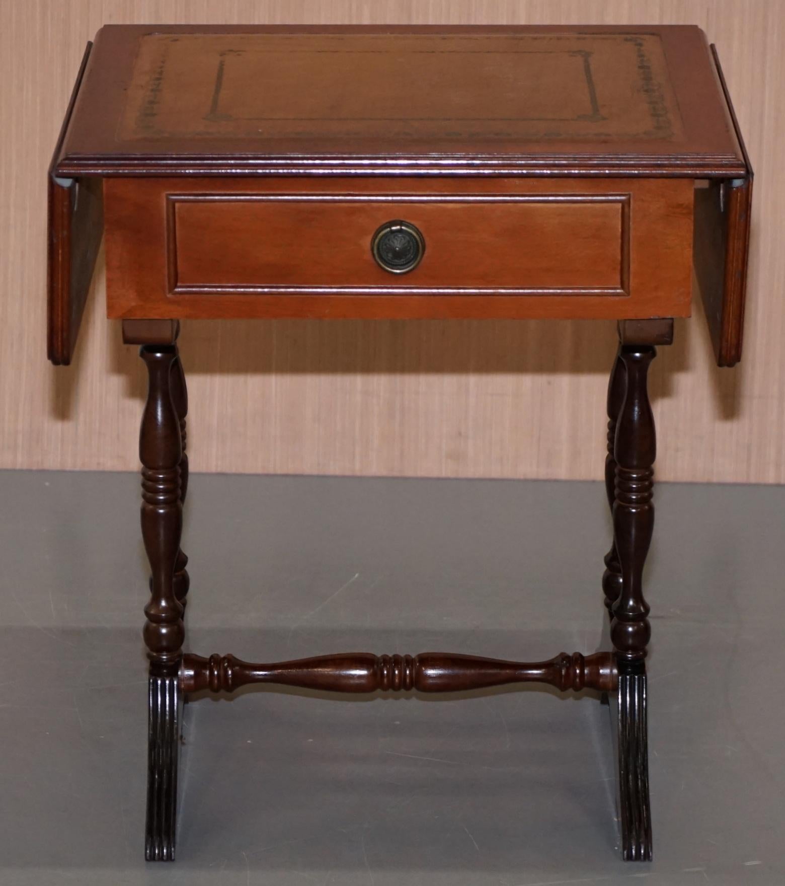 English Stunning Small Side Table with Extending Brown Leather Gold Leaf Embossed Top