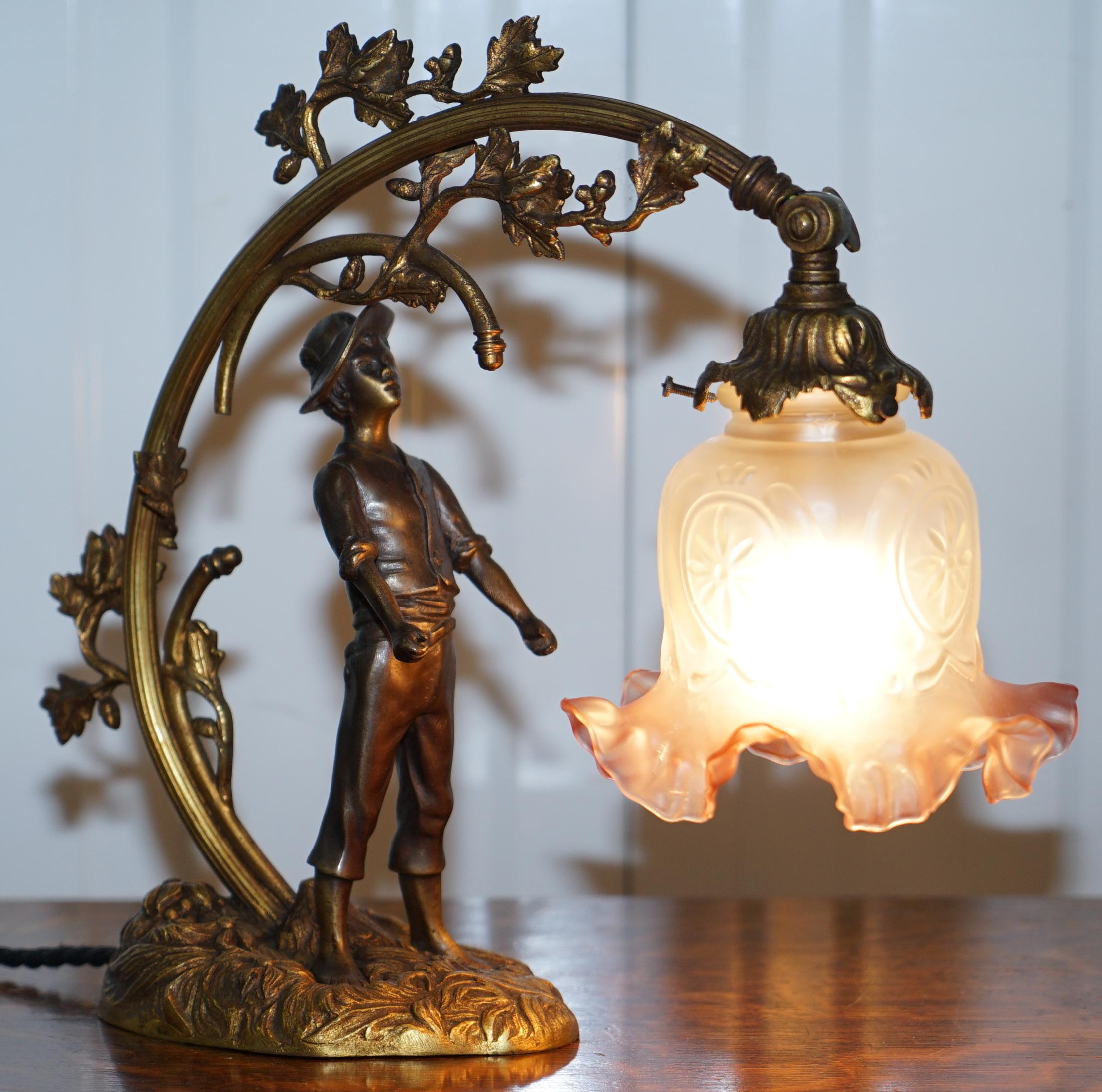 We are delighted to offer for sale this lovely original circa 1920’s continental solid bronze lamp with statue and original shade

This lamp was bought in Bruges by a specialist in restoring antique lamps, its 1920s, rare to find in all bronze and