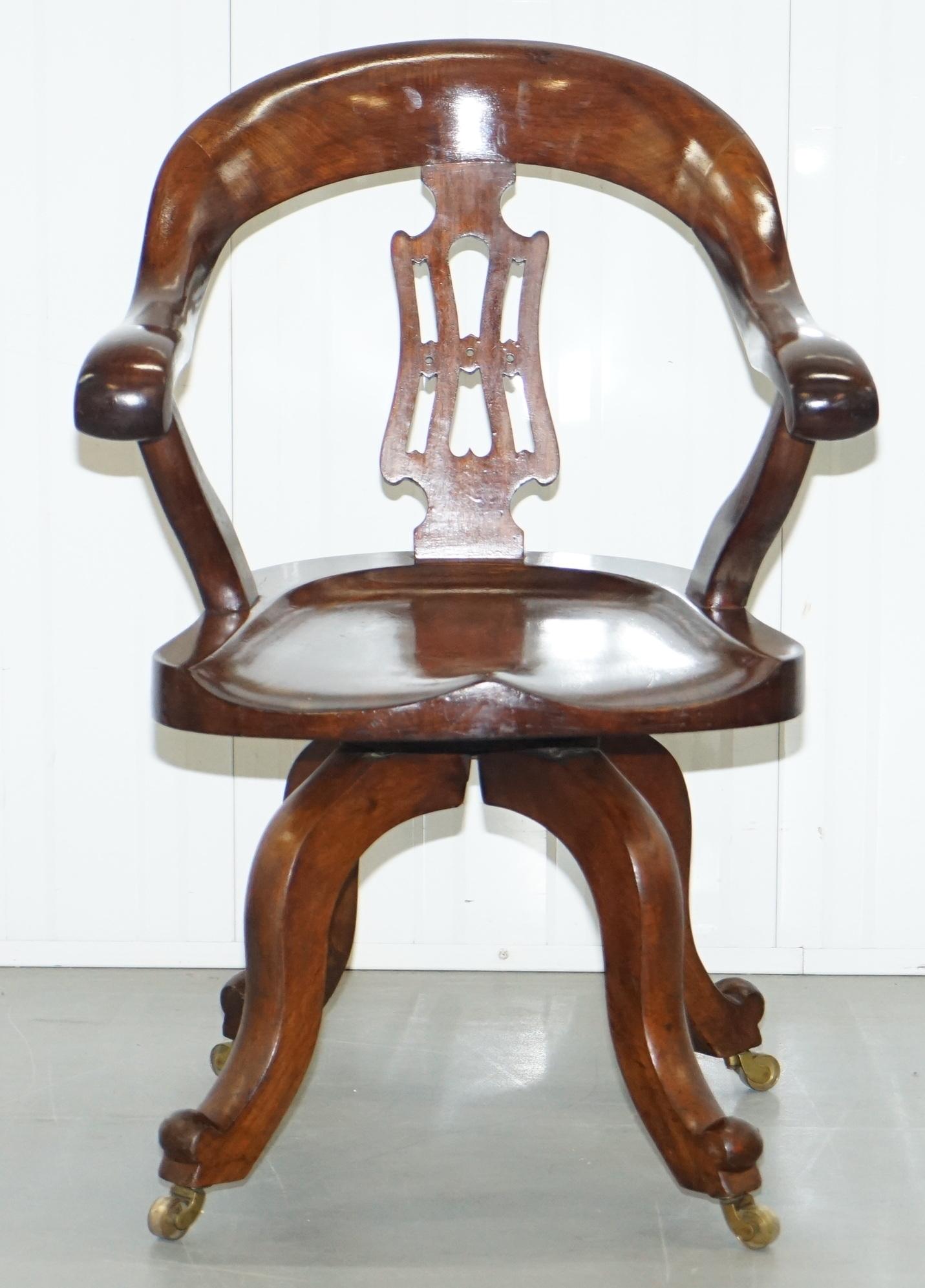 We are delighted to offer for sale this stunning original Victorian Solid mahogany swivel captain's chair

A really good looking and comfortable antique chair, the timber patina is simply glorious, the sculpted arms are very comfortable as is the