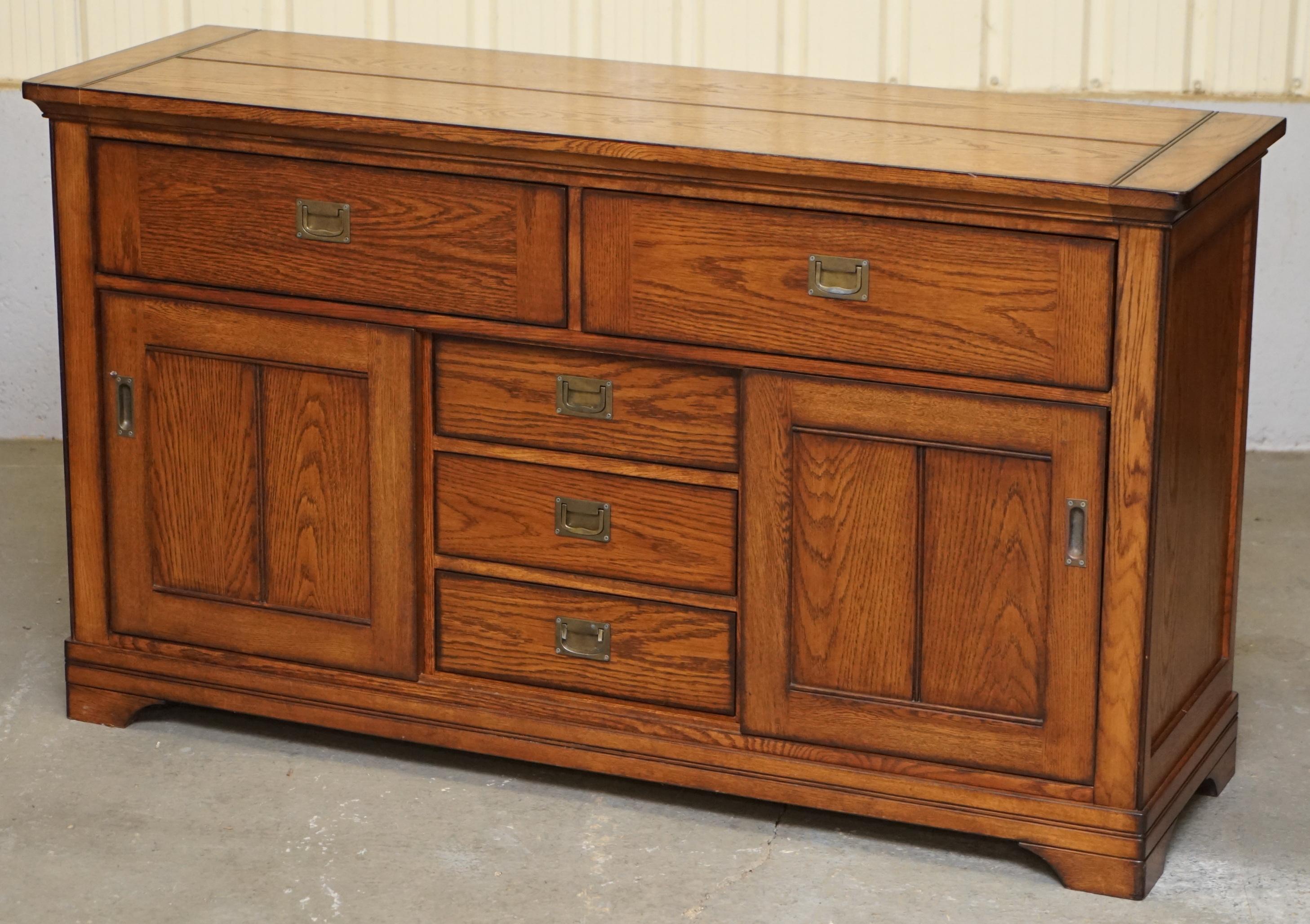 English Stunning Solid Oak Vintage Campaign Style Sideboard with Drawers and Cupboards