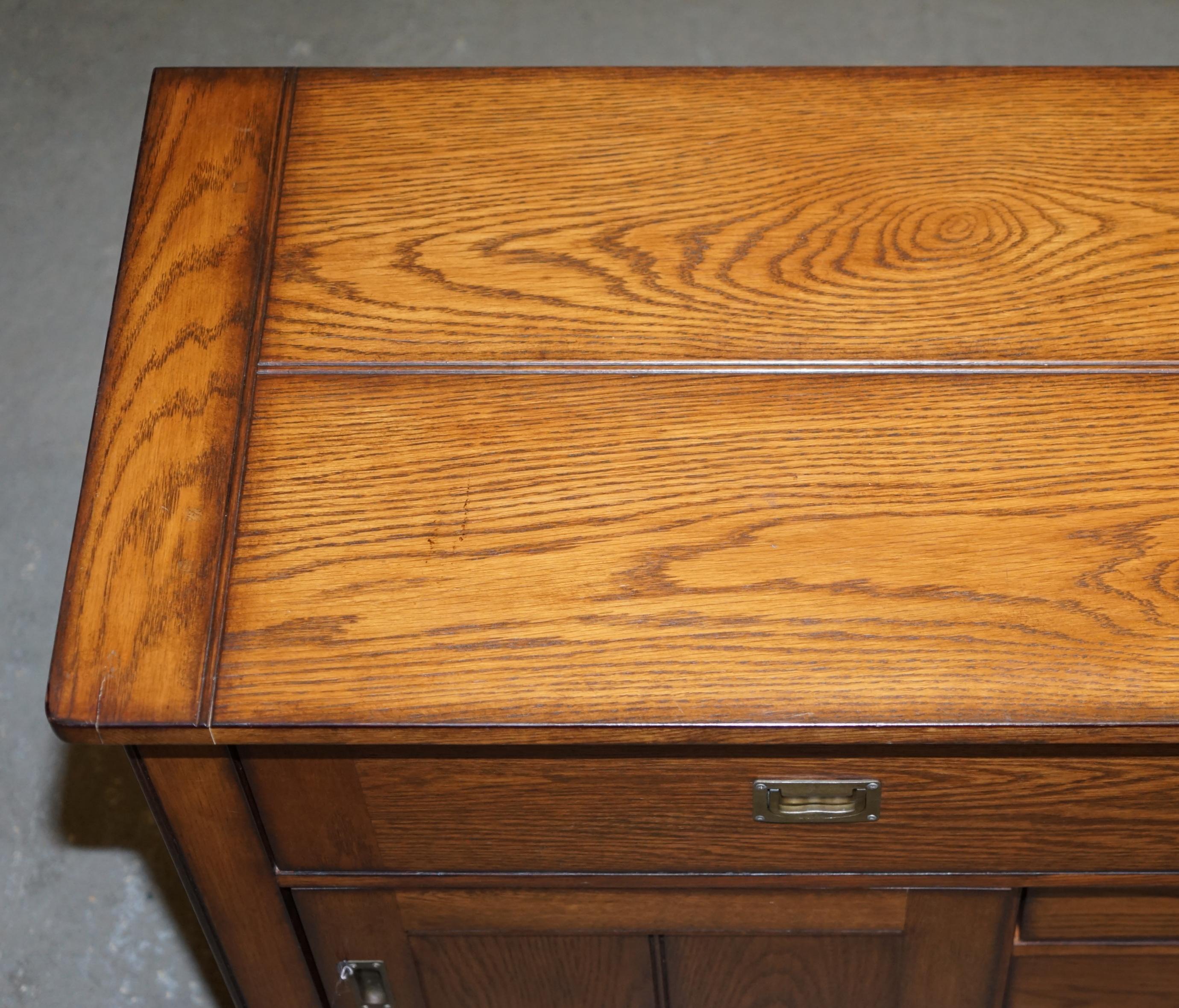 20th Century Stunning Solid Oak Vintage Campaign Style Sideboard with Drawers and Cupboards