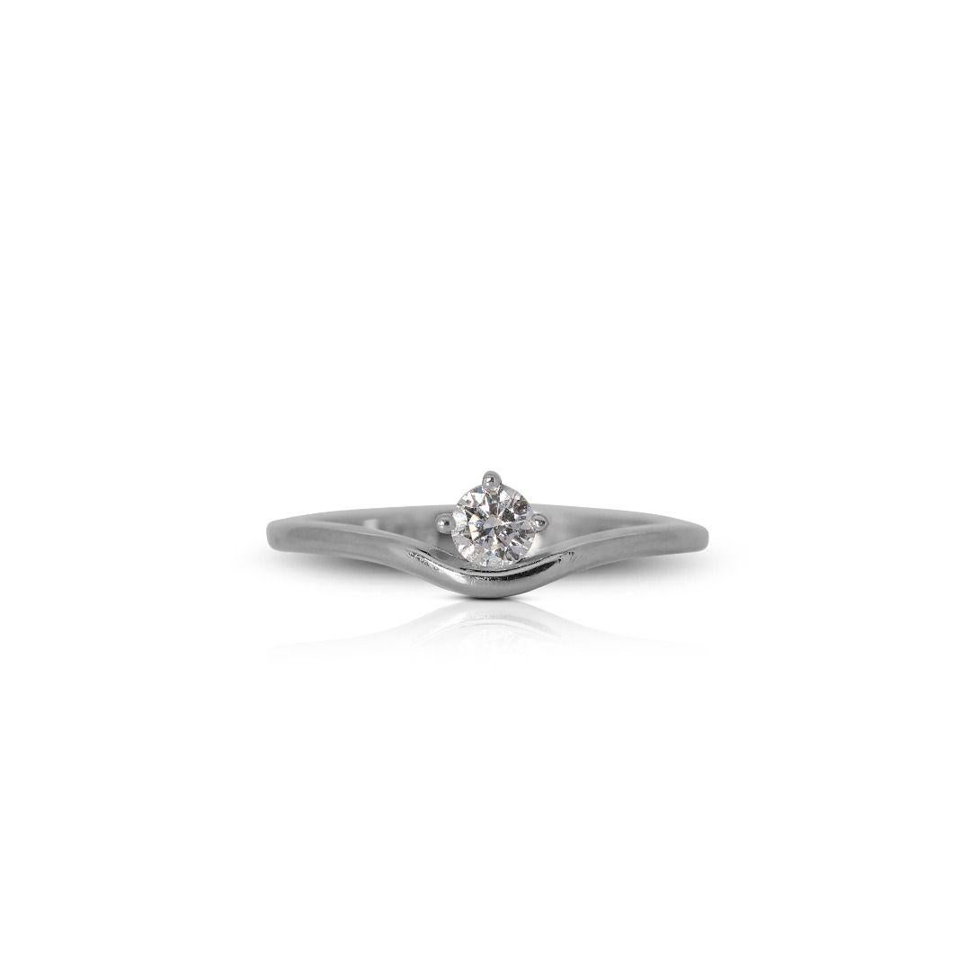 Stunning Solitaire Ring in 14K White Gold

The 14K white gold band serves as the perfect backdrop to accentuate the diamond's brilliance. White gold is a symbol of purity and timelessness, and its cool, silvery hue complements the diamond's sparkle