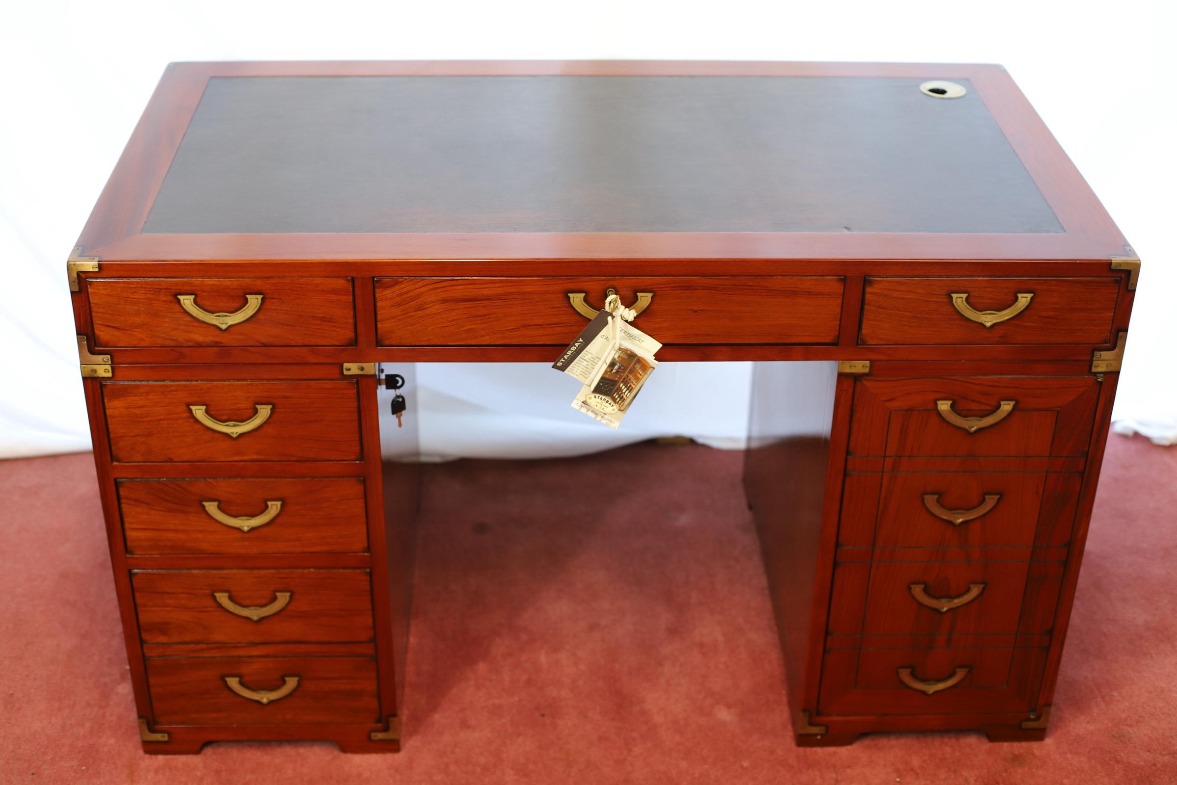 We delight to offer this amazing Starbay Rochefort bank pedestal desk, modern,with a rosewood finish, the inset full grain leather top over a combination of drawers and cupboards with sunk brass handles. In lovely condition . R.R.P £6000
Don't