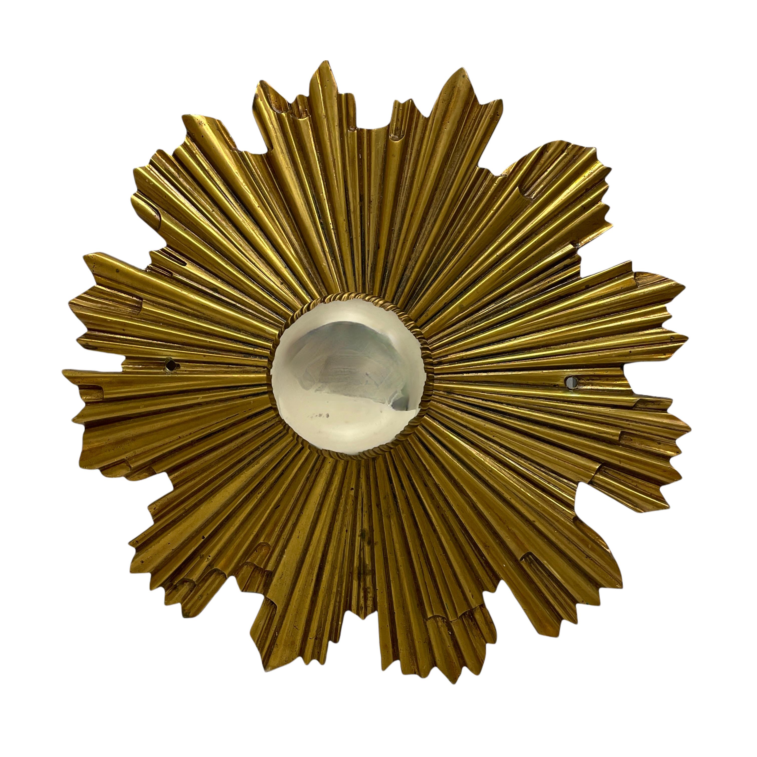 Beautiful brutalist florentine style flush mount. Made in Italy. Gorgeous sunburst starburst flush mount with a single light. The Fixture requires a European E27 / 110 Volt Edison bulb, up to 100 watts. You can also use it as wall light. This light