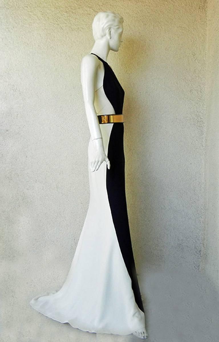 One of the best pieces I've seen from Stella McCartney. Seen at the Emmy's and was a drop-dead knockout! Elegance and high fashion at its best! 

This colorblock standout gown features racer back navy-blue and off-white bias cut silk gown; nude mesh