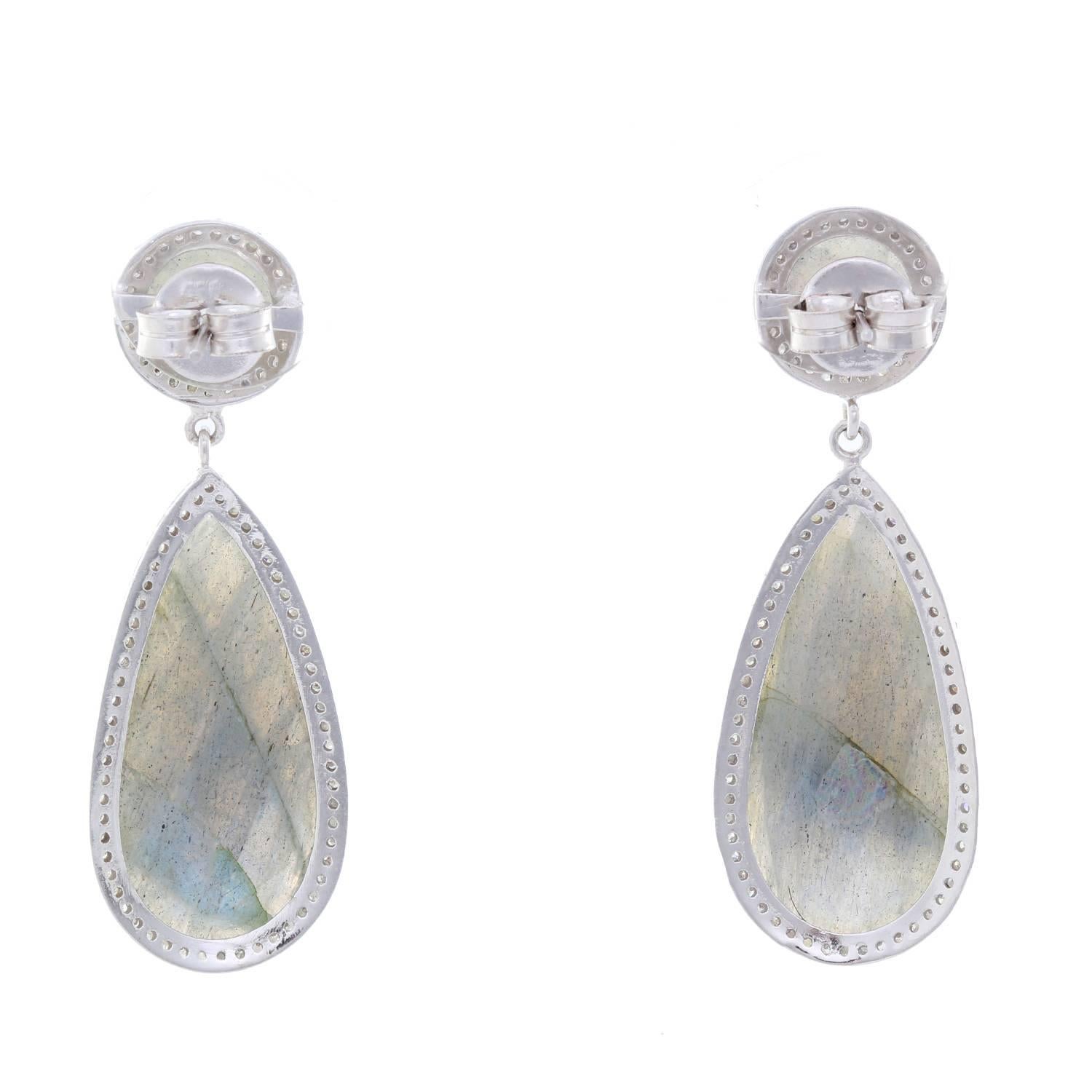 Stunning Sterling Silver Labradorite and Diamond  Dangle Earrings - . These stunning sliced Labradorite by a border of sparkling diamonds. Labradorite weight is 1.75 cts.   The earrings are large in size with the drop measuring apx. 1 1/2 inches in