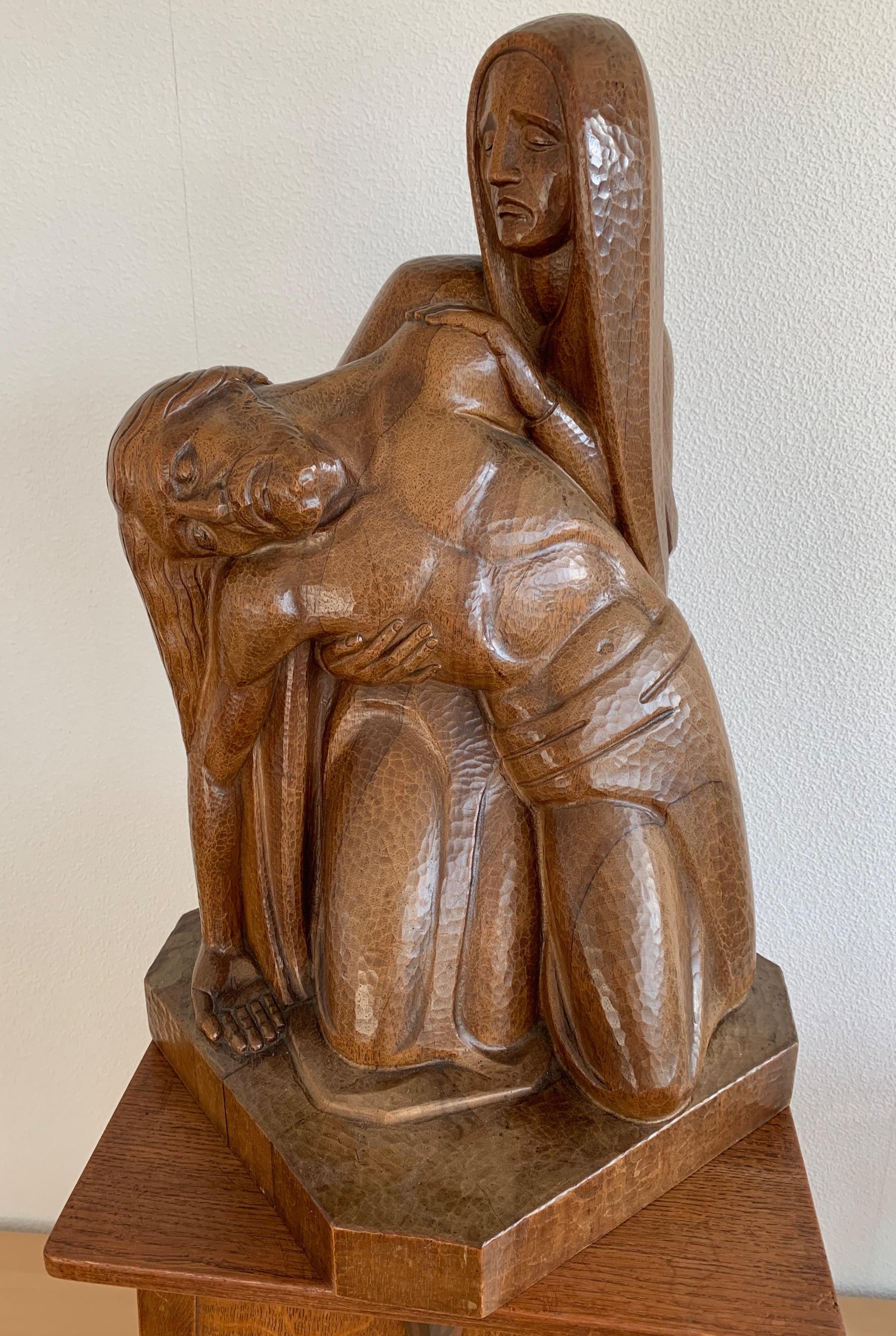 Impressive and large Art Deco Pietà carved in oak, by H. Isenmann

A Pietà, depicts the body of Jesus on the lap of mother Mary after the crucifixion. This highly impressive and angular sculpture is signed H. Isenmann and it is dated 1930 (see last