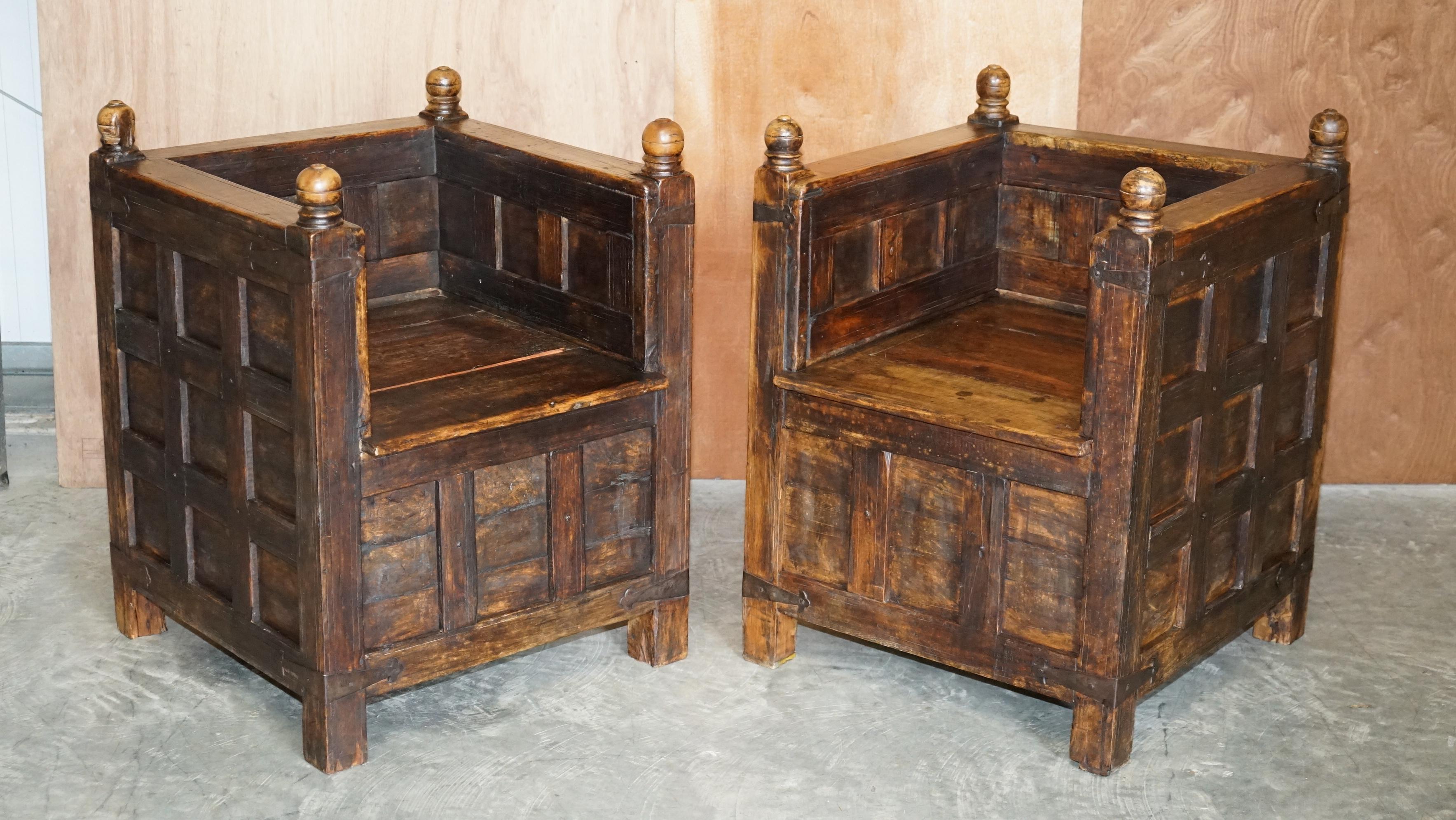 We are delighted to offer this lovely suite of original Anglo Indian circa 1880 oak and iron bound hall seating with internal storage 

A good looking and well made suite, the set includes the two person bench and the pair of matching armchairs.