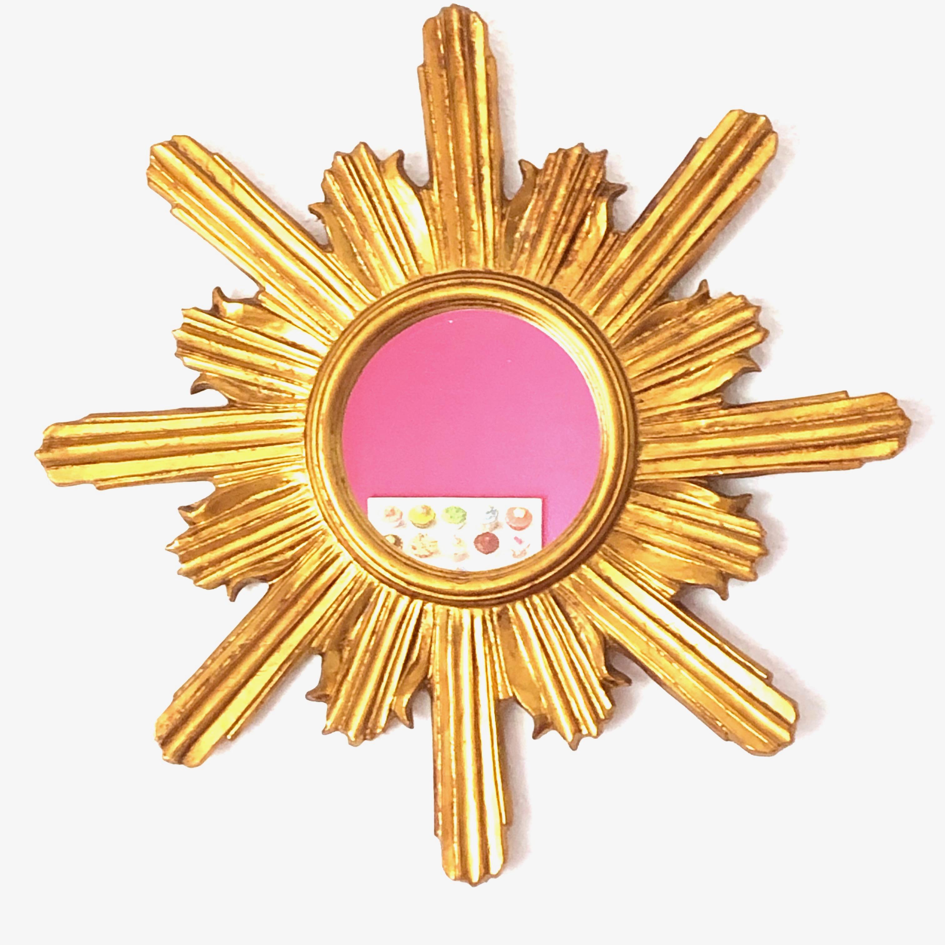 A gorgeous starburst mirror. Made of gilded wood and stucco. No chips, no cracks, no repairs. It measures approximate 23 ¼
